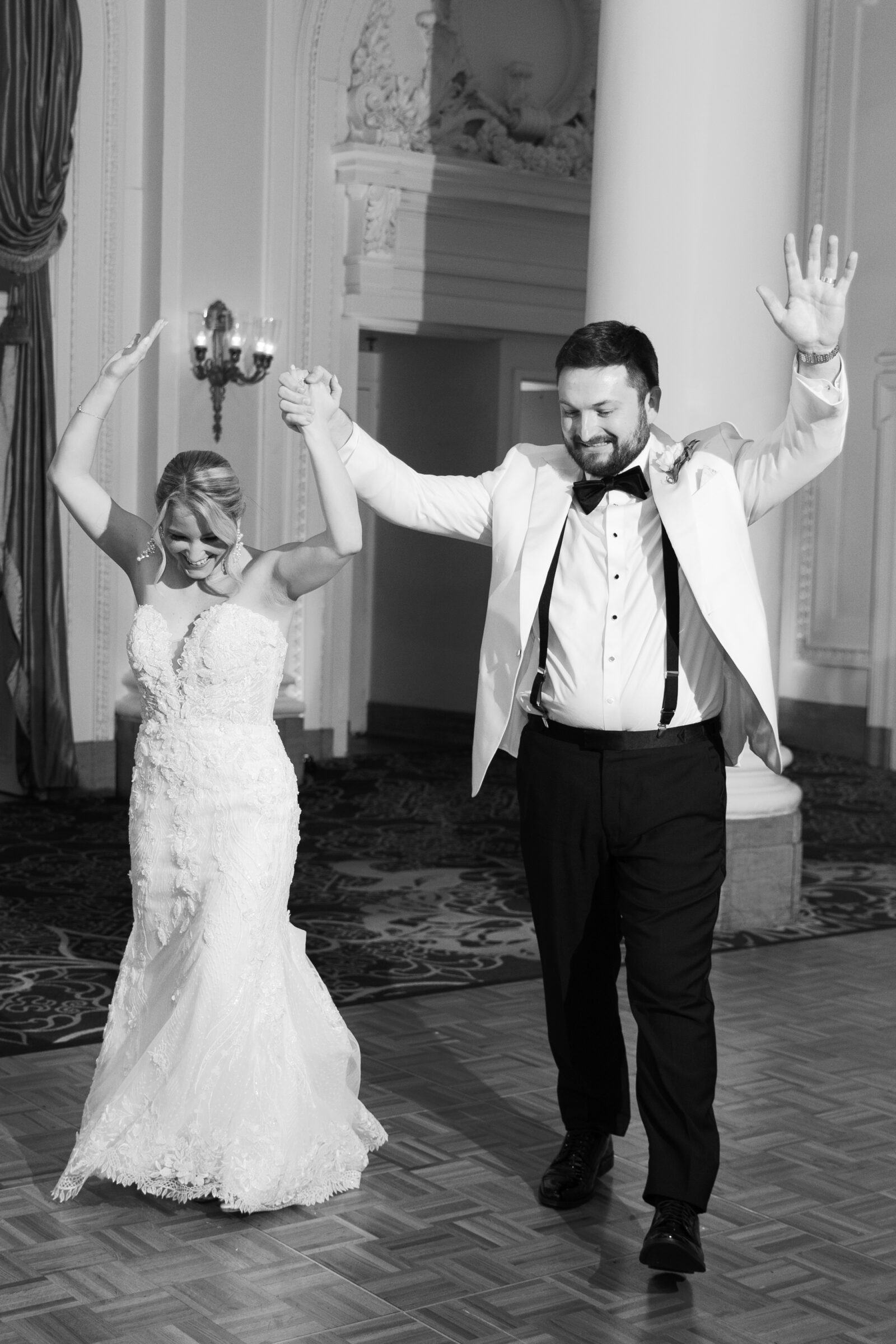 Jefferson Hotel Wedding in Richmond, VA | RVA Wedding Photographer | black and white image of bride and groom entering their wedding reception at the Jefferson Hotel in Richmond