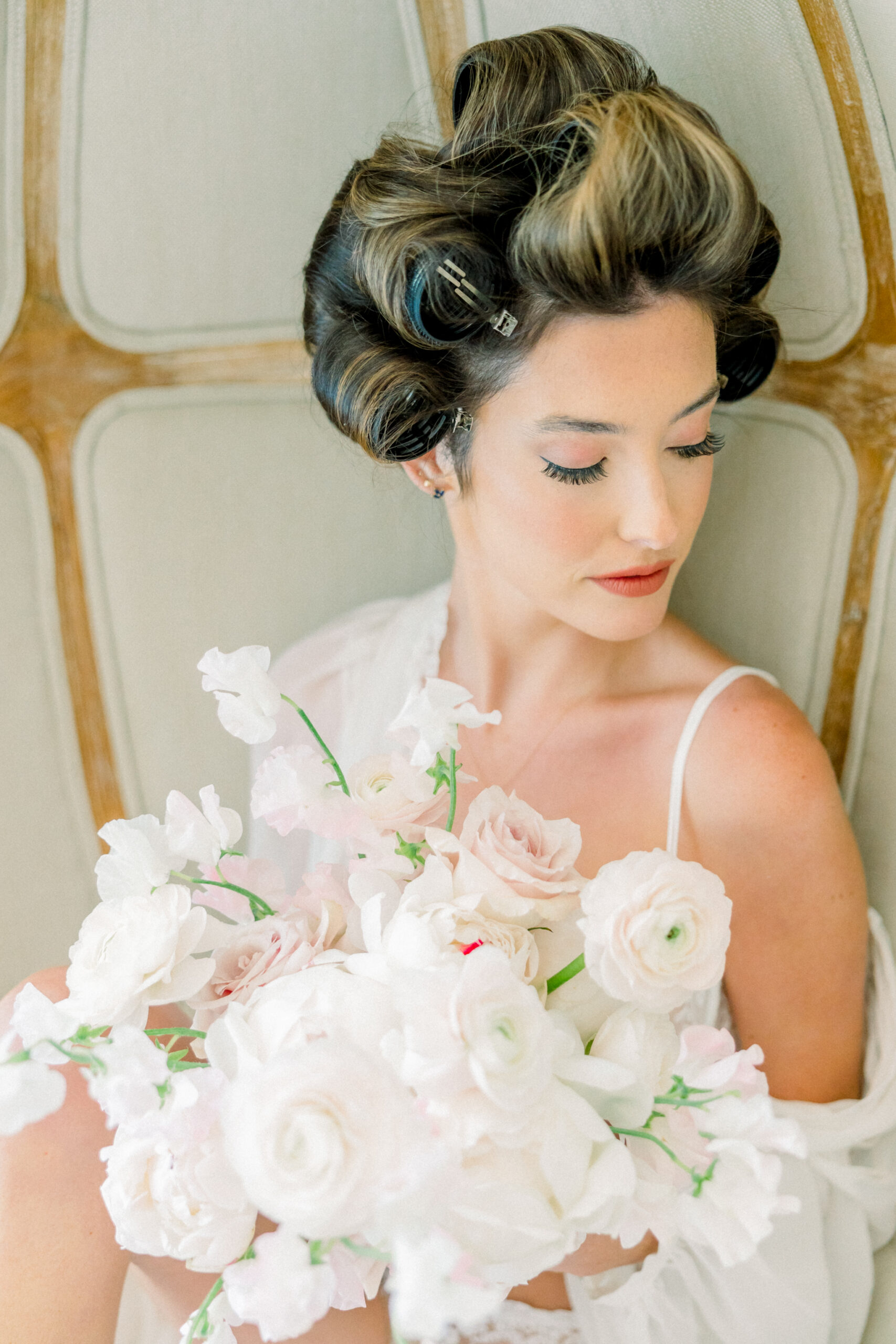 Spring Boudoir in Richmond | girl in white lingerie holding delicate flowers