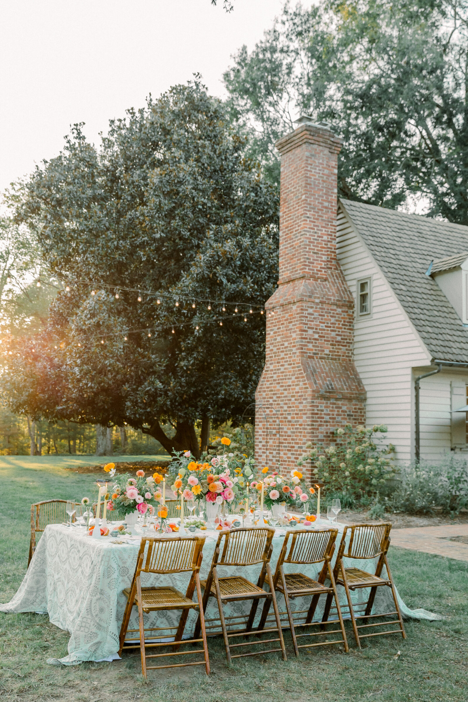 Seven Spring Wedding in King William, VA | Richmond Wedding Photographer | al fresco reception table setting at Seven Spring with vibrant florals and green patterned tablecloth