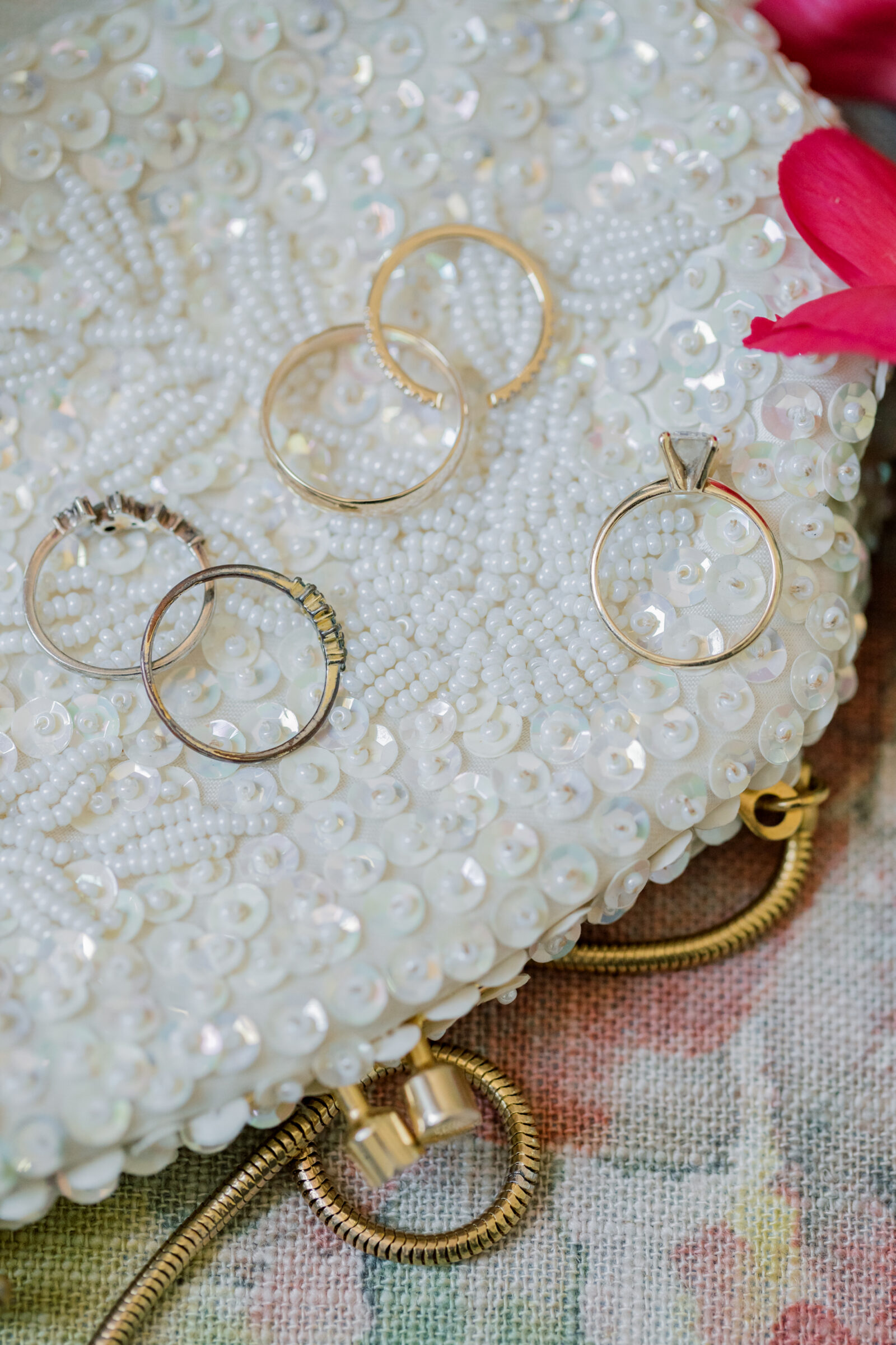 Wedding at Three Oaks Manor in Madison Heights, VA | Virginia Wedding Photographer | gold wedding rings on a white purse