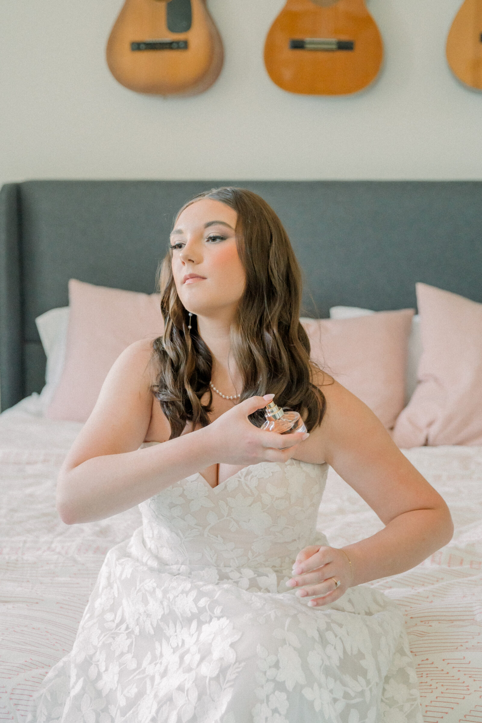 Lynchburg Virginia Wedding Photographer | bride apples perfume while getting ready for her Three Oaks Manor wedding in Virginia