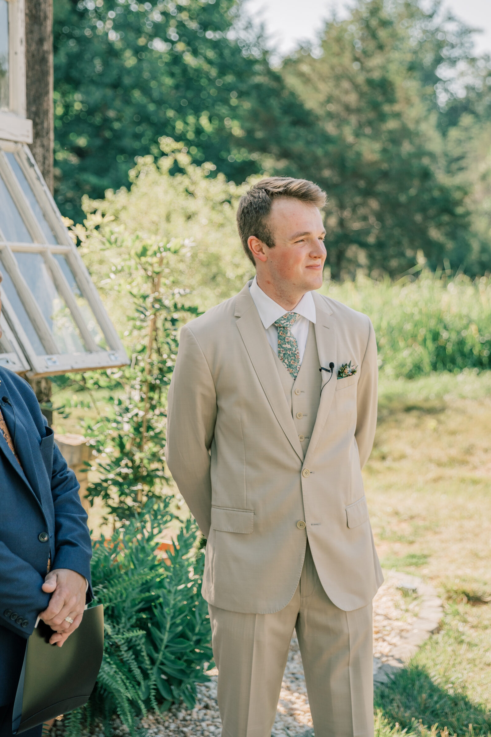 Three Oaks Manor Wedding in Madison Heights, VA | Virginia Wedding Photographer | groom in tan suit watches as bride walks down the aisle