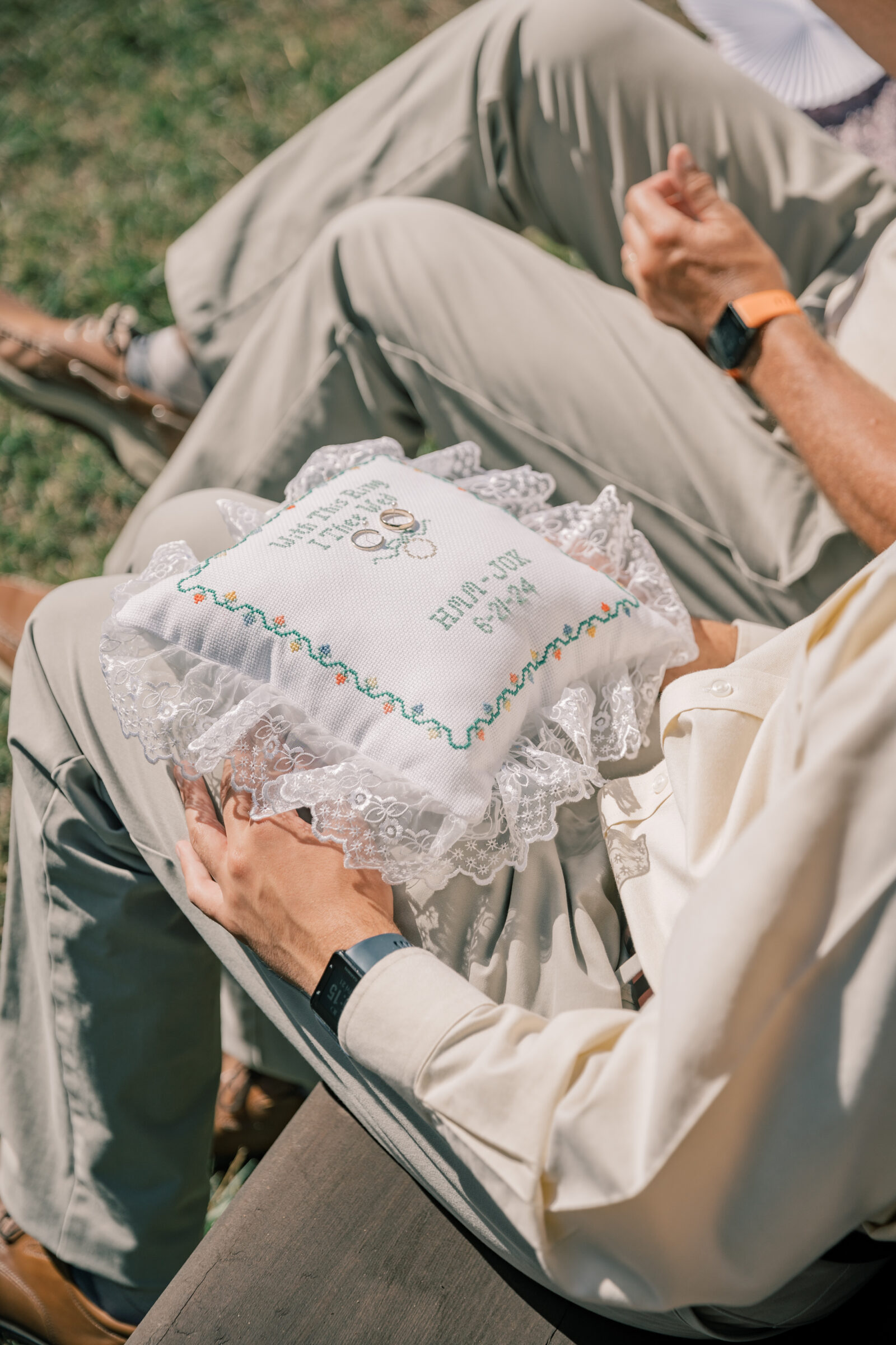 Three Oaks Manor Wedding in Madison Heights, VA | Virginia Wedding Photographer | wedding bands rest on custom embroidered pillow during wedding ceremony