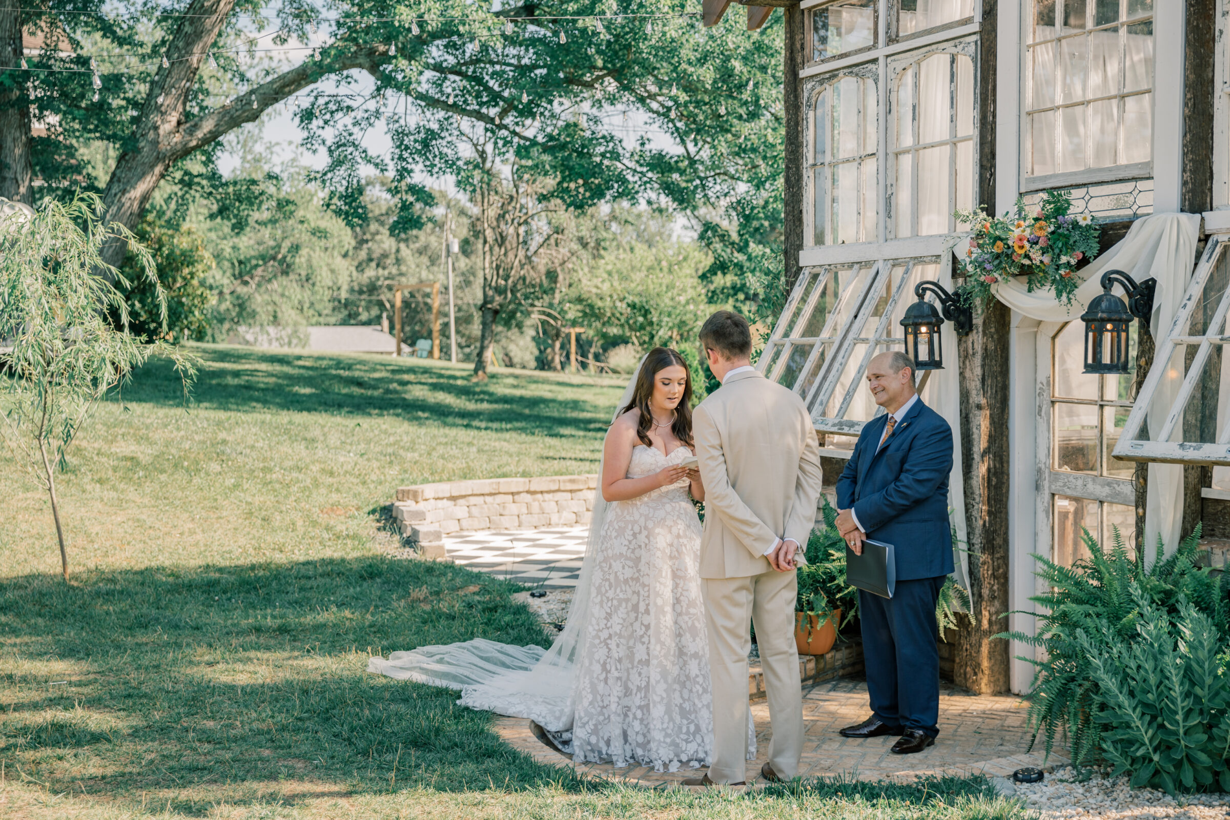 Three Oaks Manor Wedding in Madison Heights, VA | Virginia Wedding Photographer | bride reads personal wedding vows during wedding ceremony