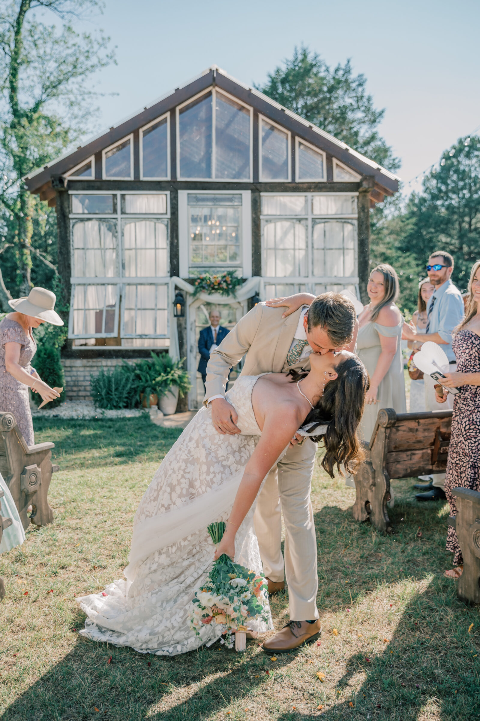 Three Oaks Manor Wedding in Madison Heights, VA | Virginia Wedding Photographer | bride and groom share kiss in the aisle after their wedding ceremony