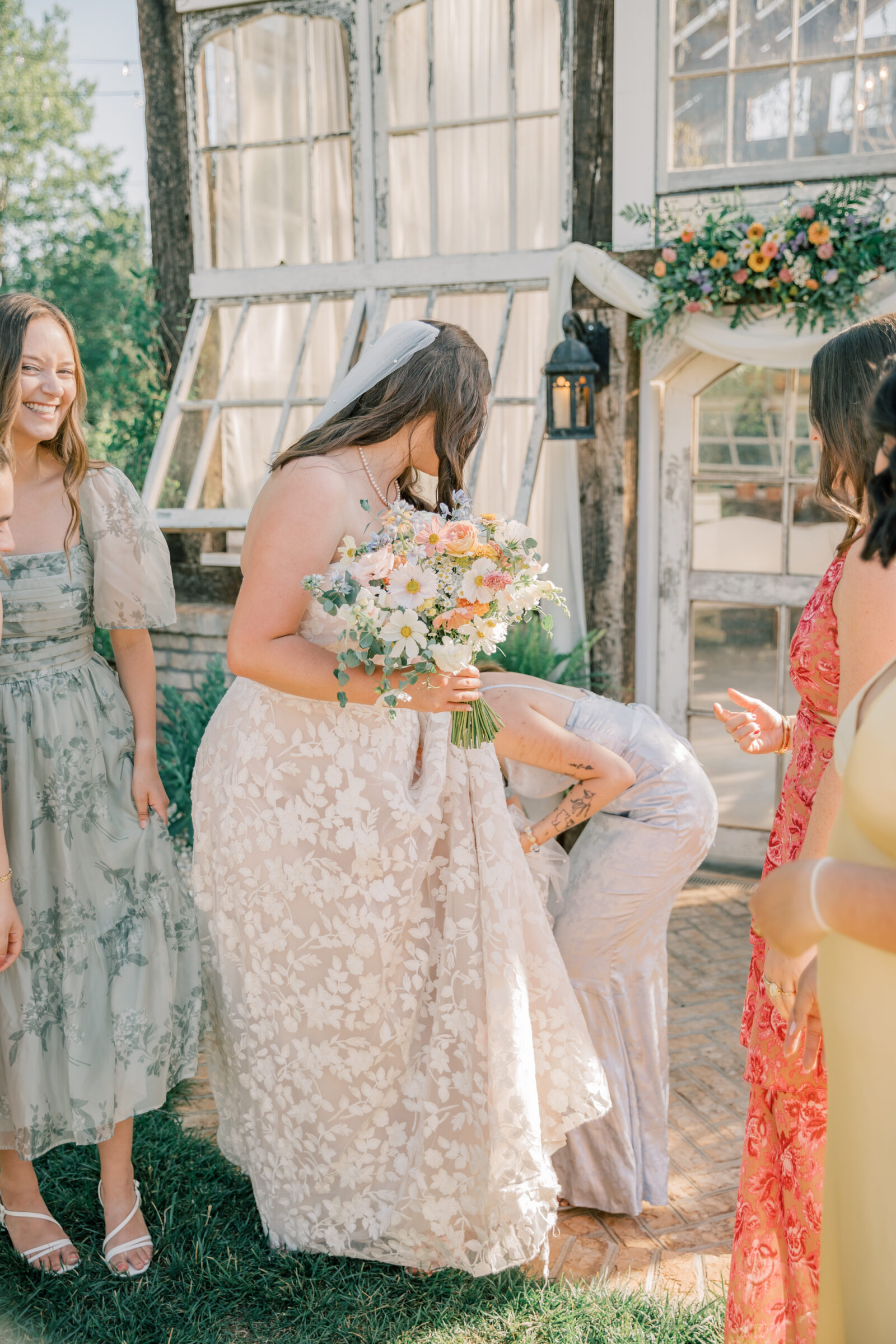 Three Oaks Manor Wedding in Madison Heights, VA | Virginia Wedding Photographer | bridesmaids help bride with her dress