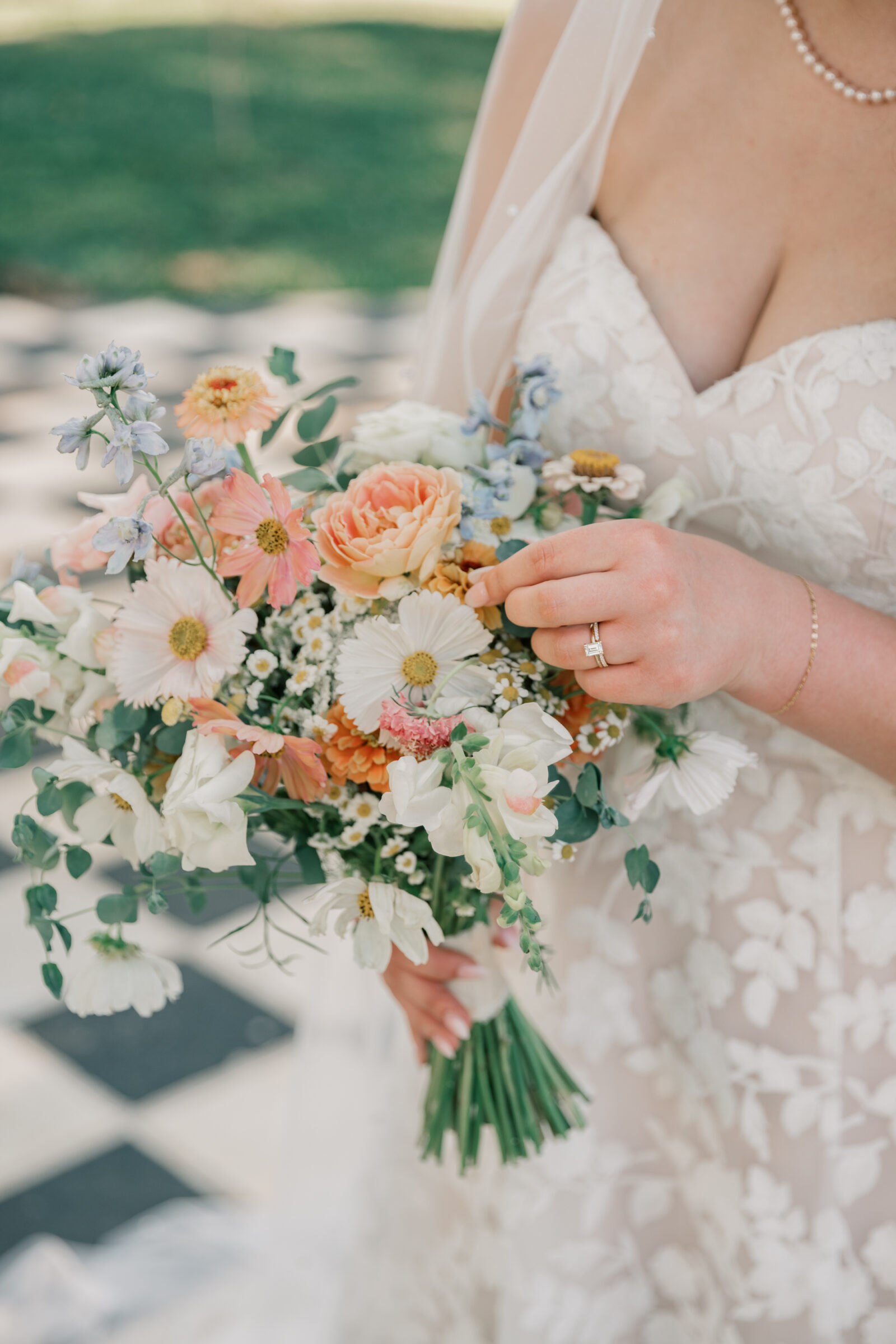 Three Oaks Manor Wedding in Madison Heights, VA | Virginia Wedding Photographer | bride shows off her rings as she delicately touches her bridal bouquet