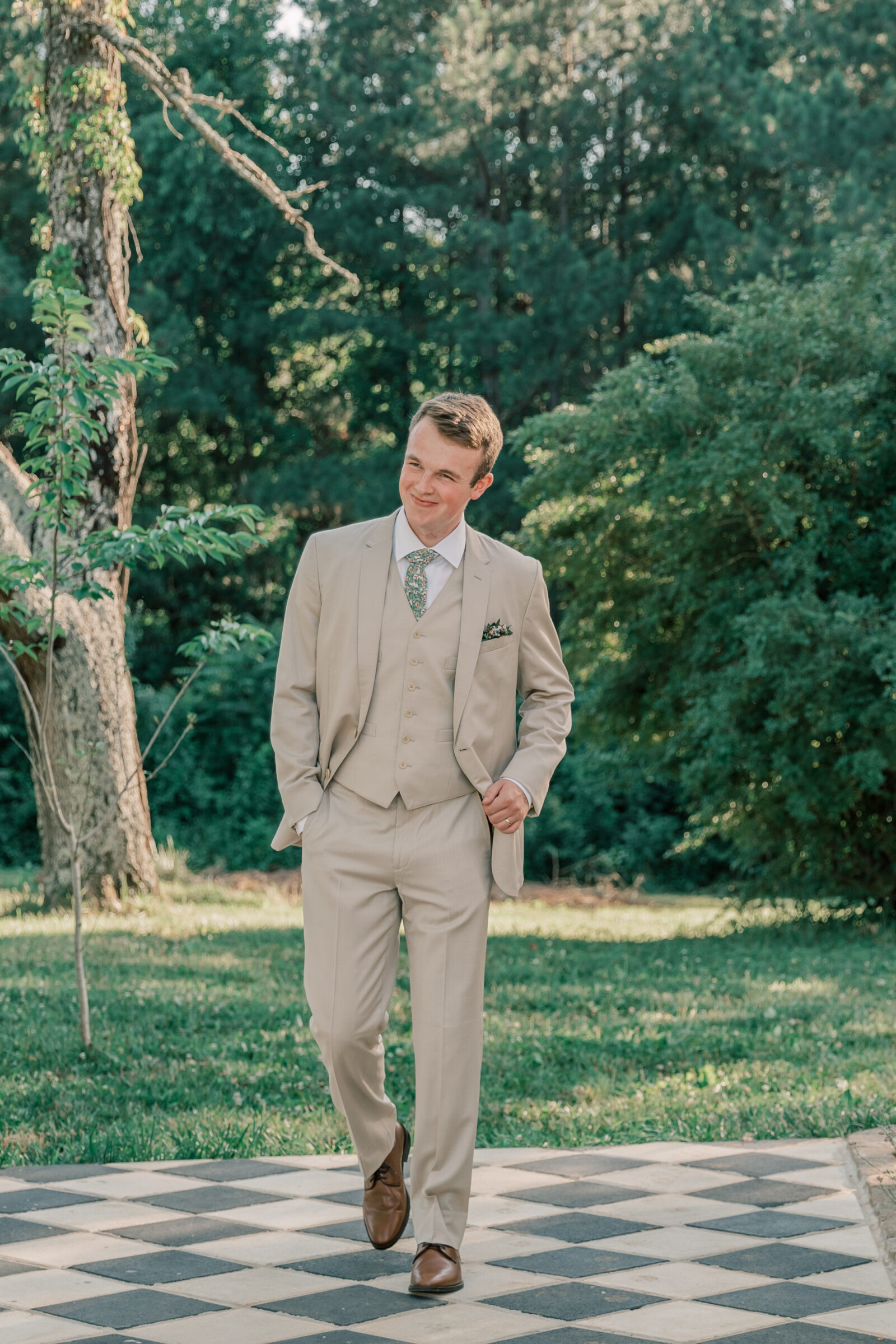 Three Oaks Manor Wedding in Madison Heights, VA | Virginia Wedding Photographer | groom in tan suit walking