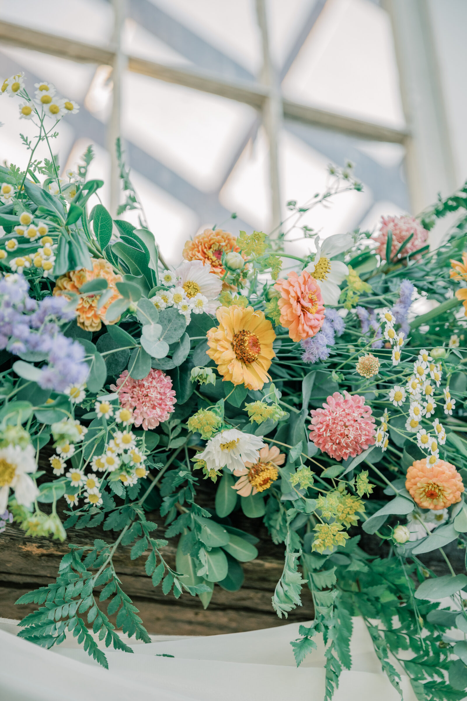 Wedding at Three Oaks Manor in Madison Heights, VA | Virginia Wedding Photographer | wildflowers above the door to the greenhouse at Three Oaks Manor in Virginia