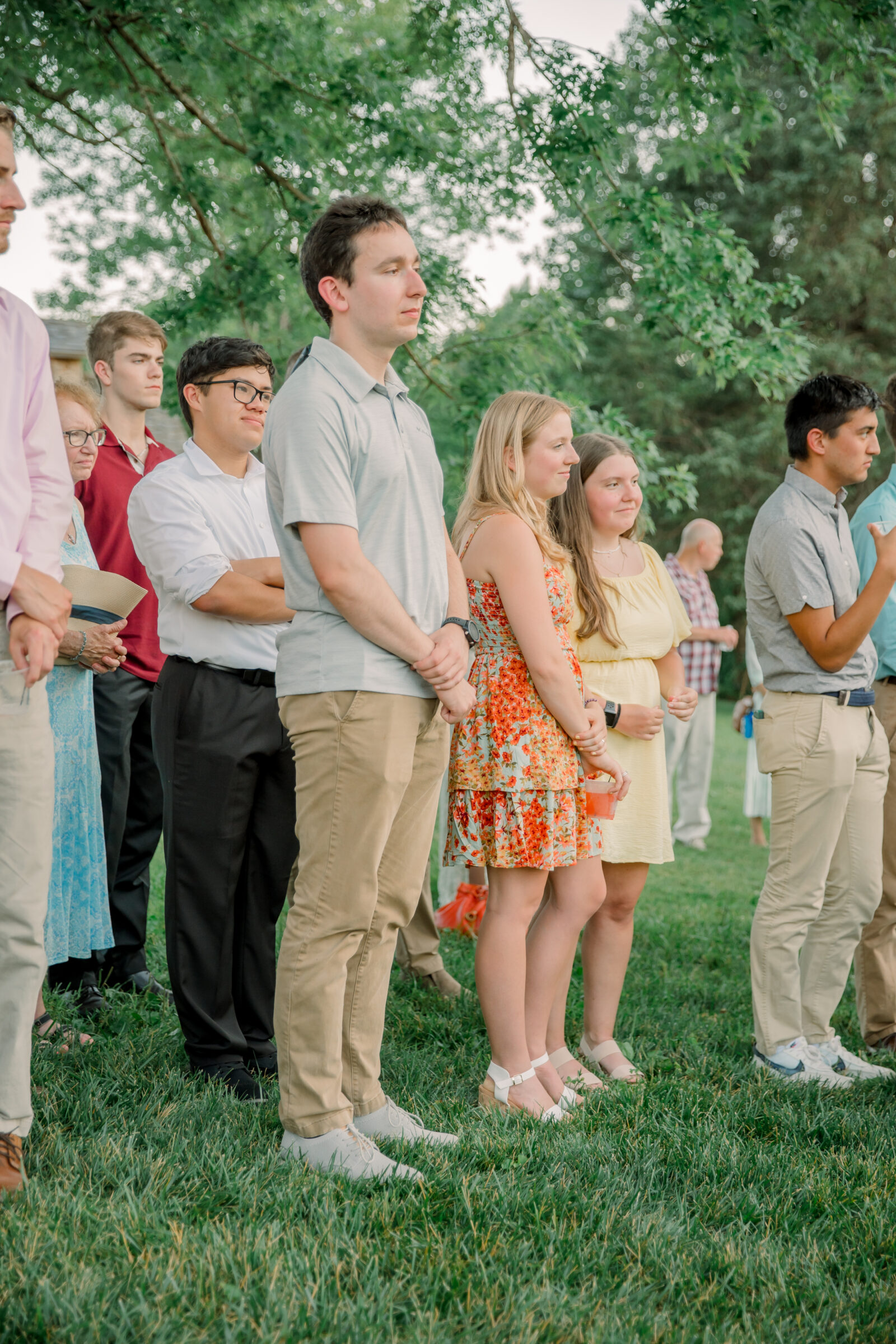 Three Oaks Manor Wedding in Madison Heights, VA | Virginia Wedding Photographer | guests stand outside as they watch the bride and groom's first dance