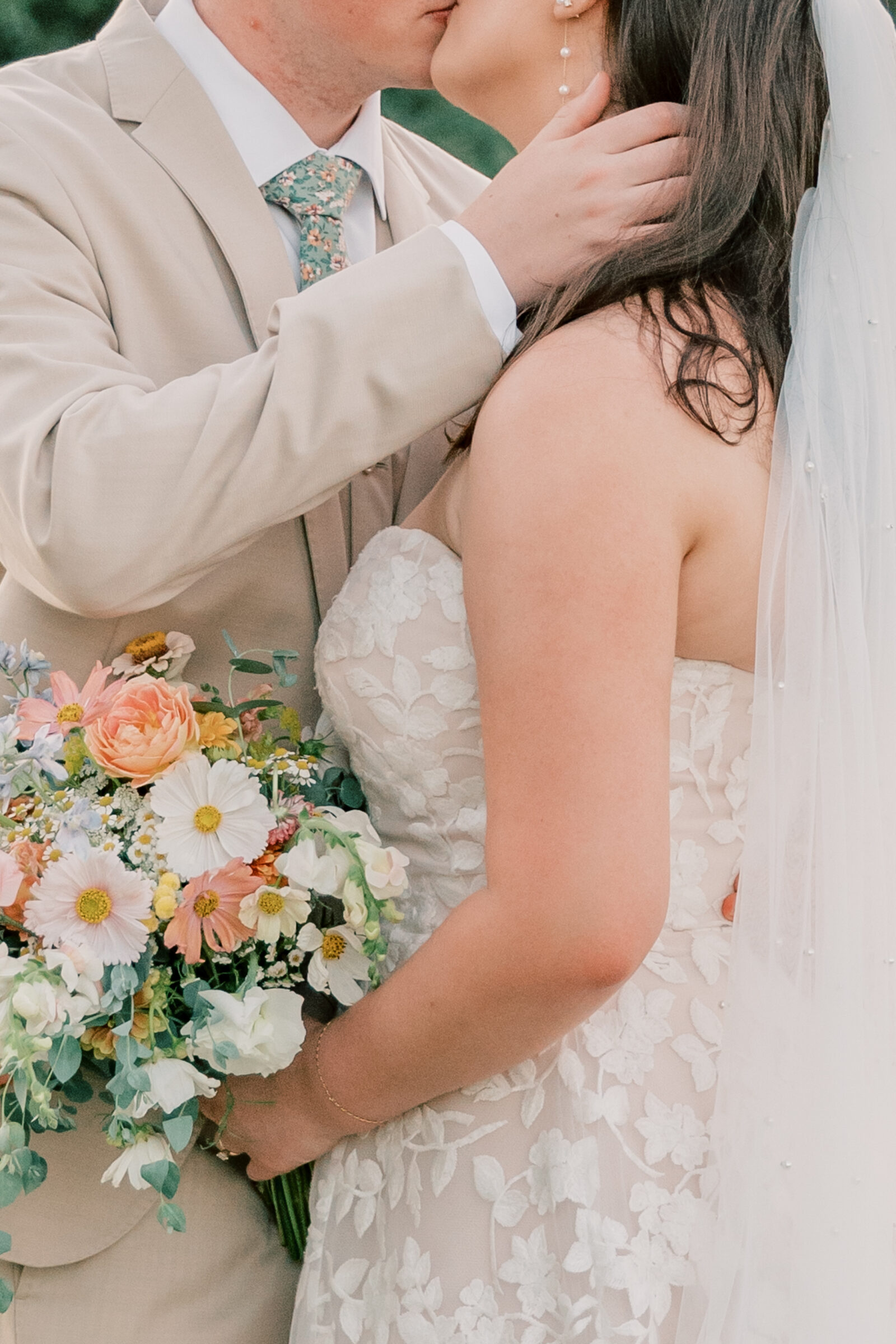 Three Oaks Manor Wedding in Madison Heights, VA | Virginia Wedding Photographer | romantic closeup image of groom pulling his bride in for a kiss