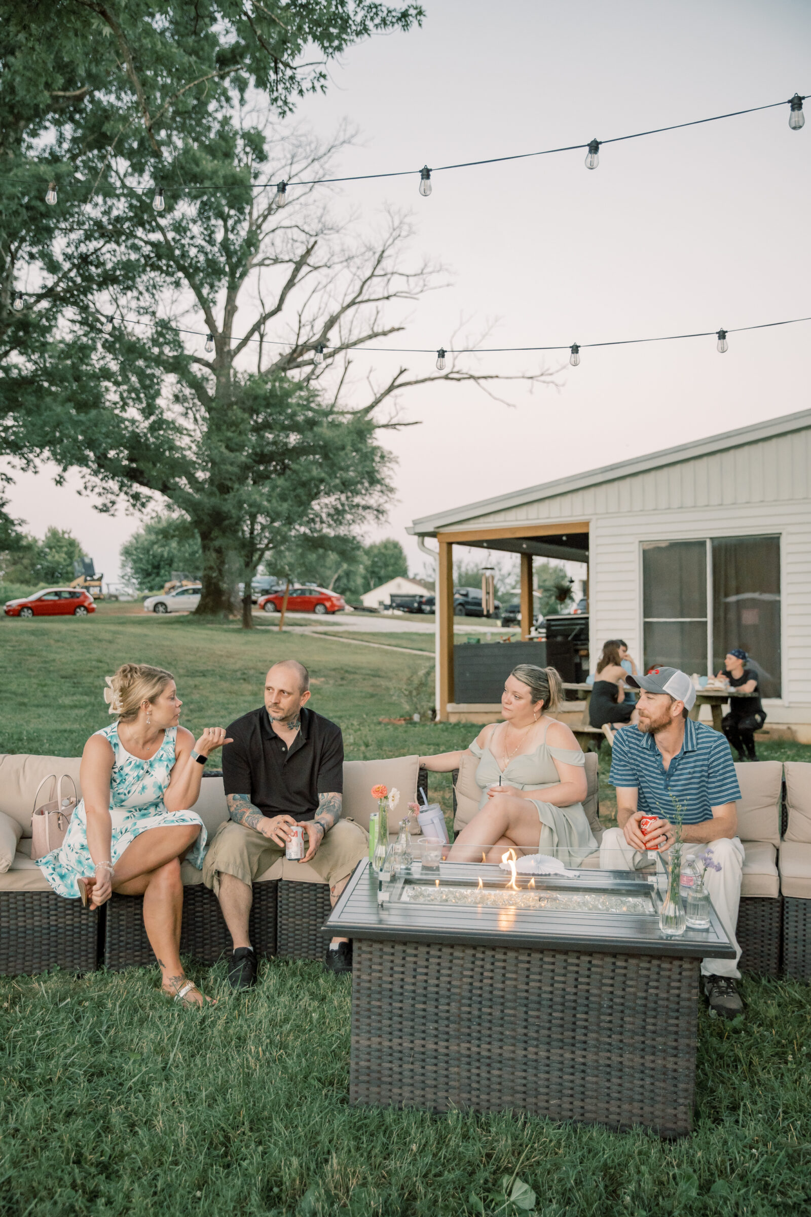 Three Oaks Manor Wedding in Madison Heights, VA | Virginia Wedding Photographer | guests enjoy wedding reception by the firepit at Three Oaks Manor