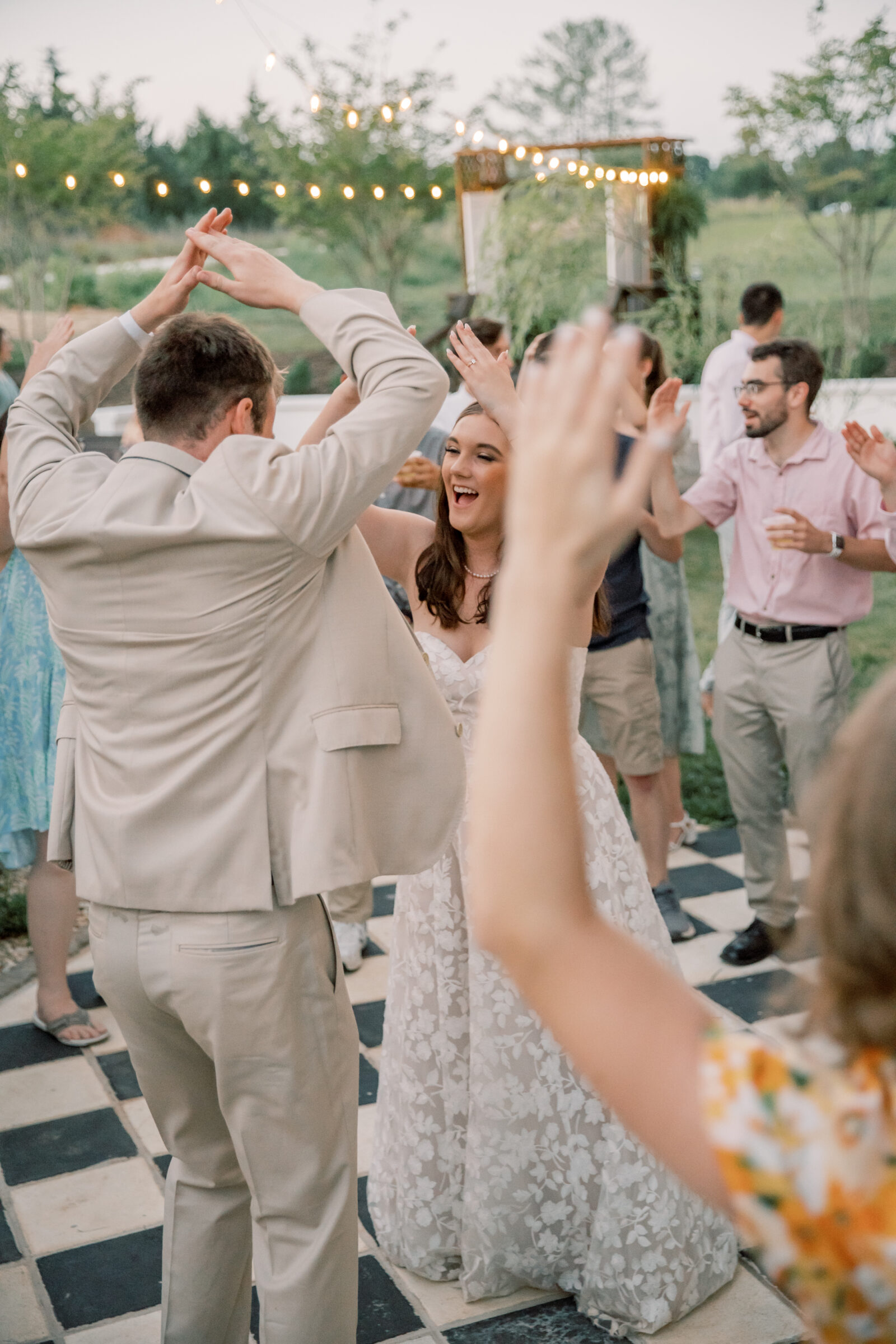 Three Oaks Manor Wedding in Madison Heights, VA | Virginia Wedding Photographer | bride and groom dancing with their friends at wedding reception