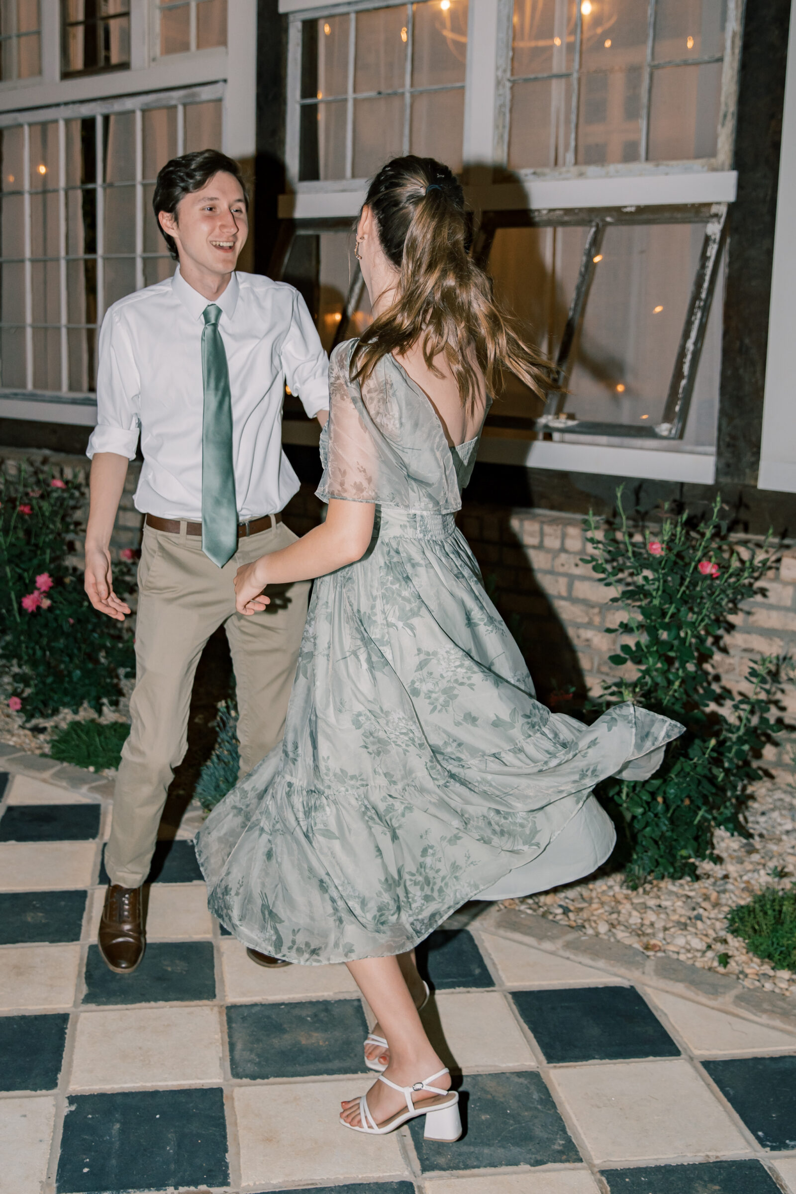 Three Oaks Manor Wedding in Madison Heights, VA | Virginia Wedding Photographer | guest spins his date on the dance floor at a wedding reception