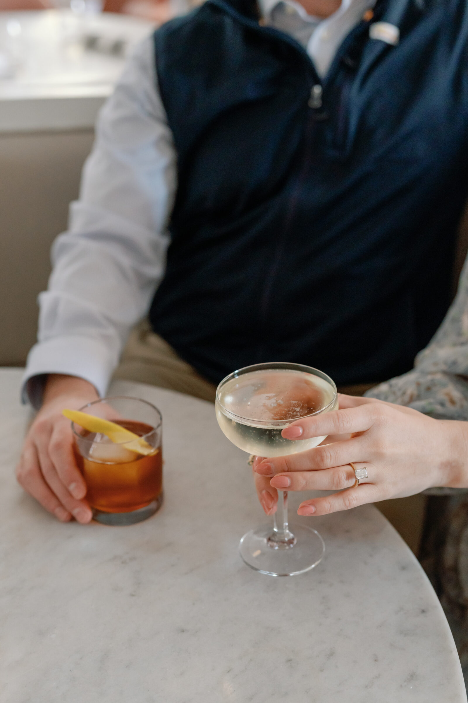 Quirk Hotel RVA Engagement Session in Richmond, VA | Wedding Photographer in Richmond | couple holding cocktails at Richmond bar engagement session