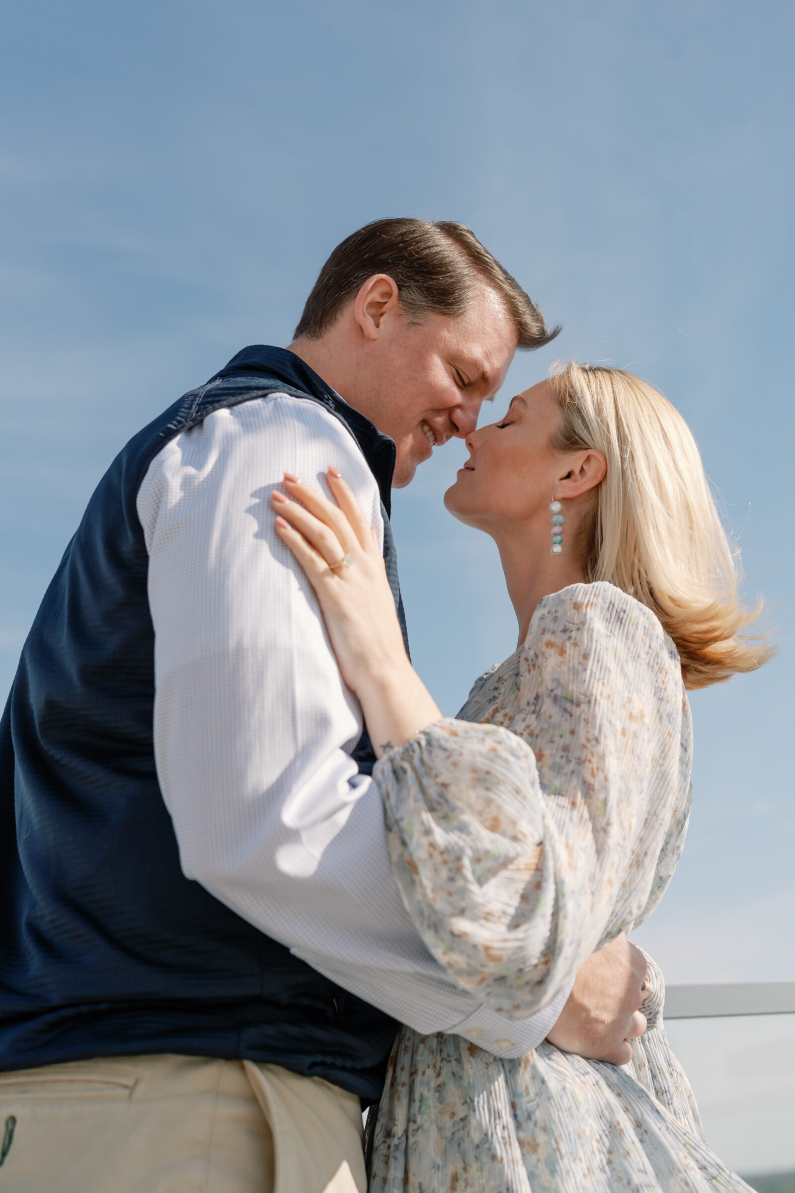 Quirk Hotel RVA Engagement Session in Richmond, VA | Wedding Photographer in Richmond | couple nose to nose on the rooftop of the Quirk Hotel in Richmond