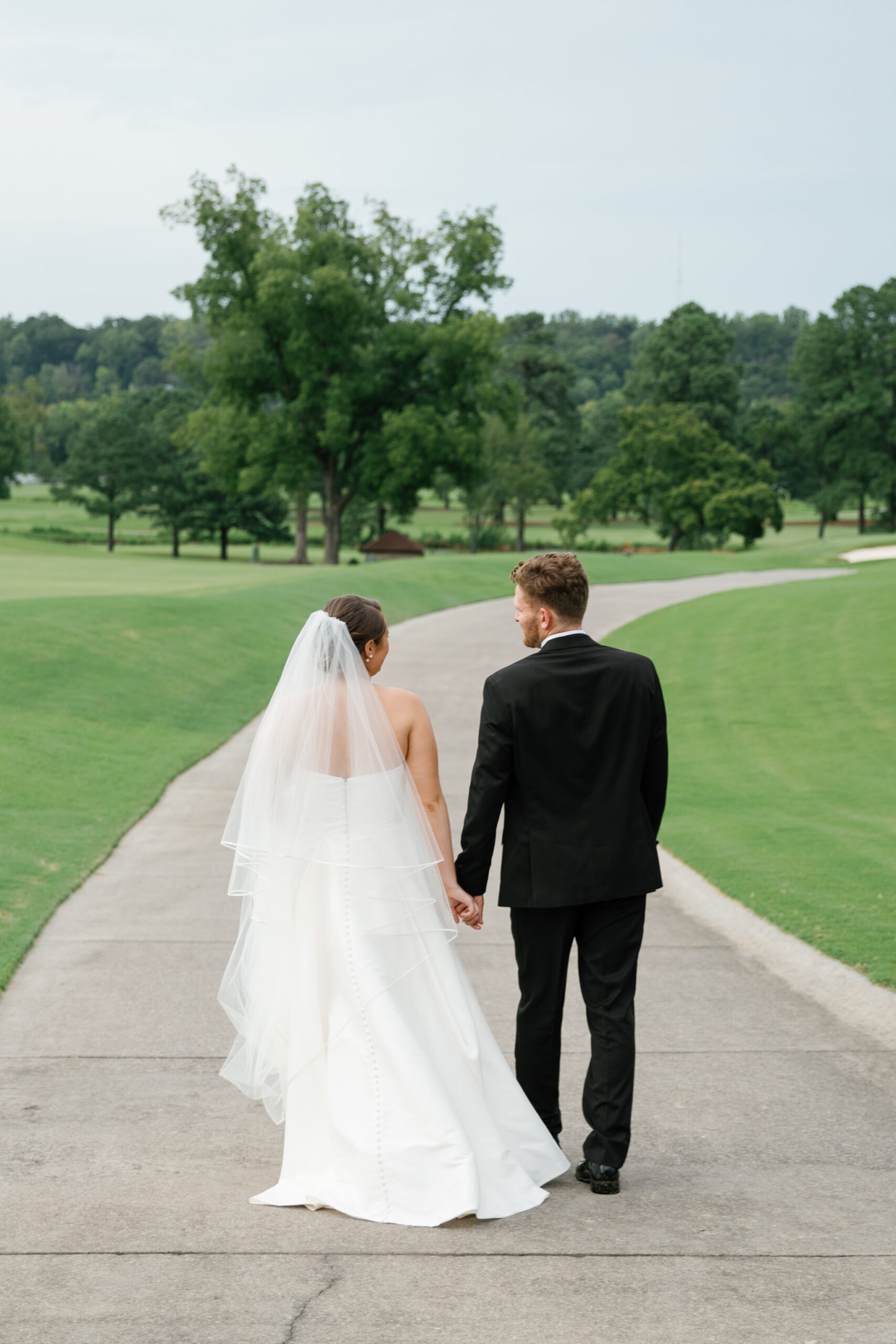 Willow Oaks Country Club Wedding in Richmond, VA | Country Club Venues in Richmond | bride and groom walking on the golf course of their Richmond country club venue