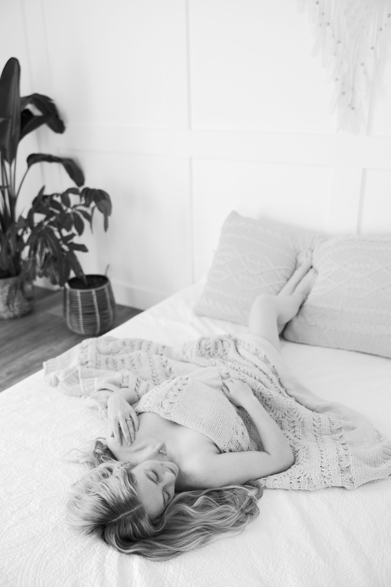 Romantic Bridal Boudoir Session in Richmond VA | black and white image of a girl with a blanket over her