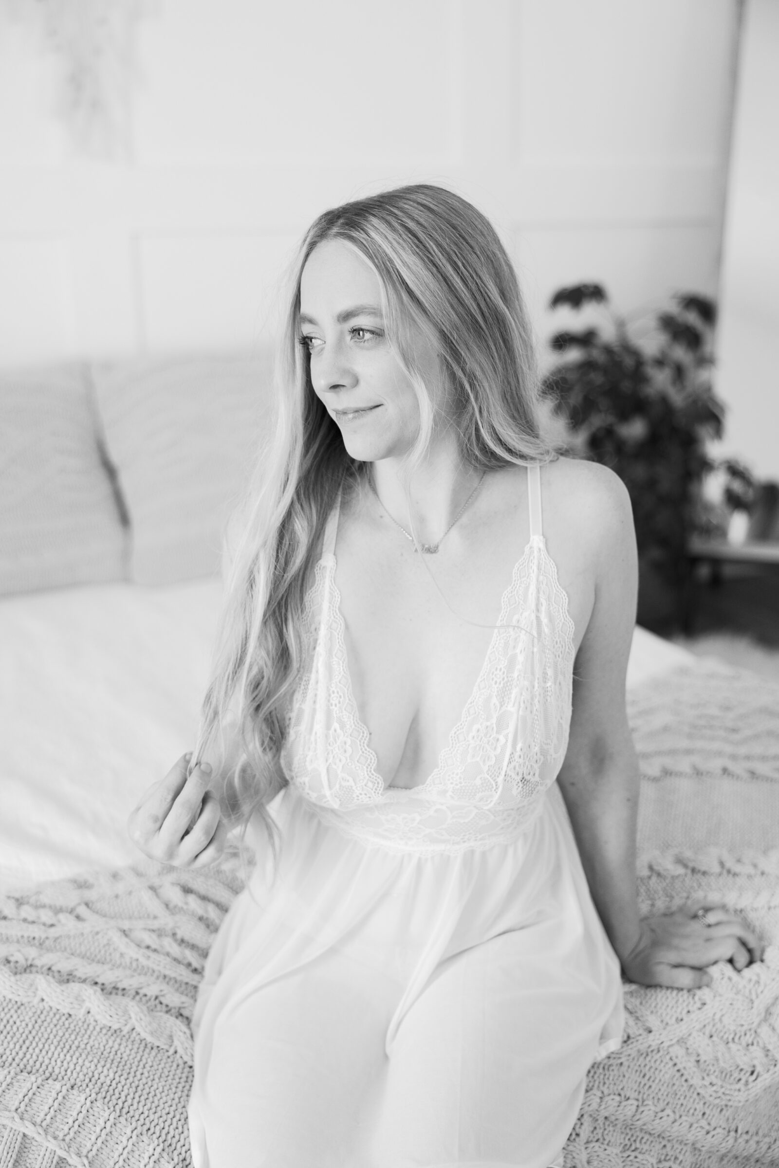 Romantic Bridal Boudoir Session in Richmond VA | black and white image of girl in white lace lingerie