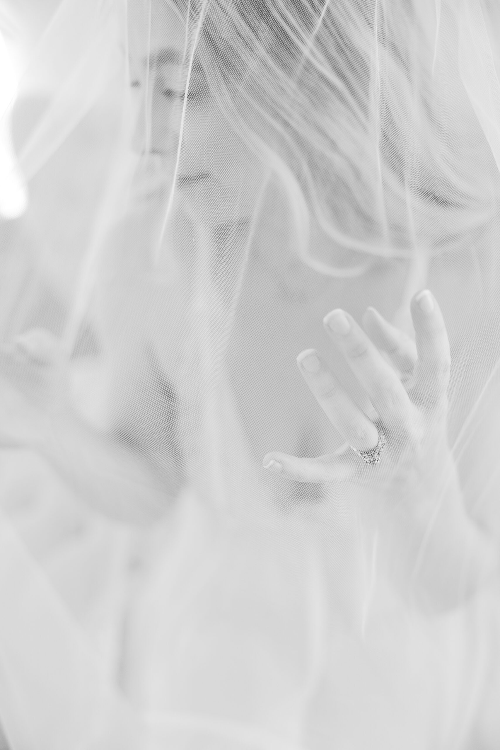 Bridal Boudoir in Richmond VA | black and white image of girl in white lace lingerie with bridal veil