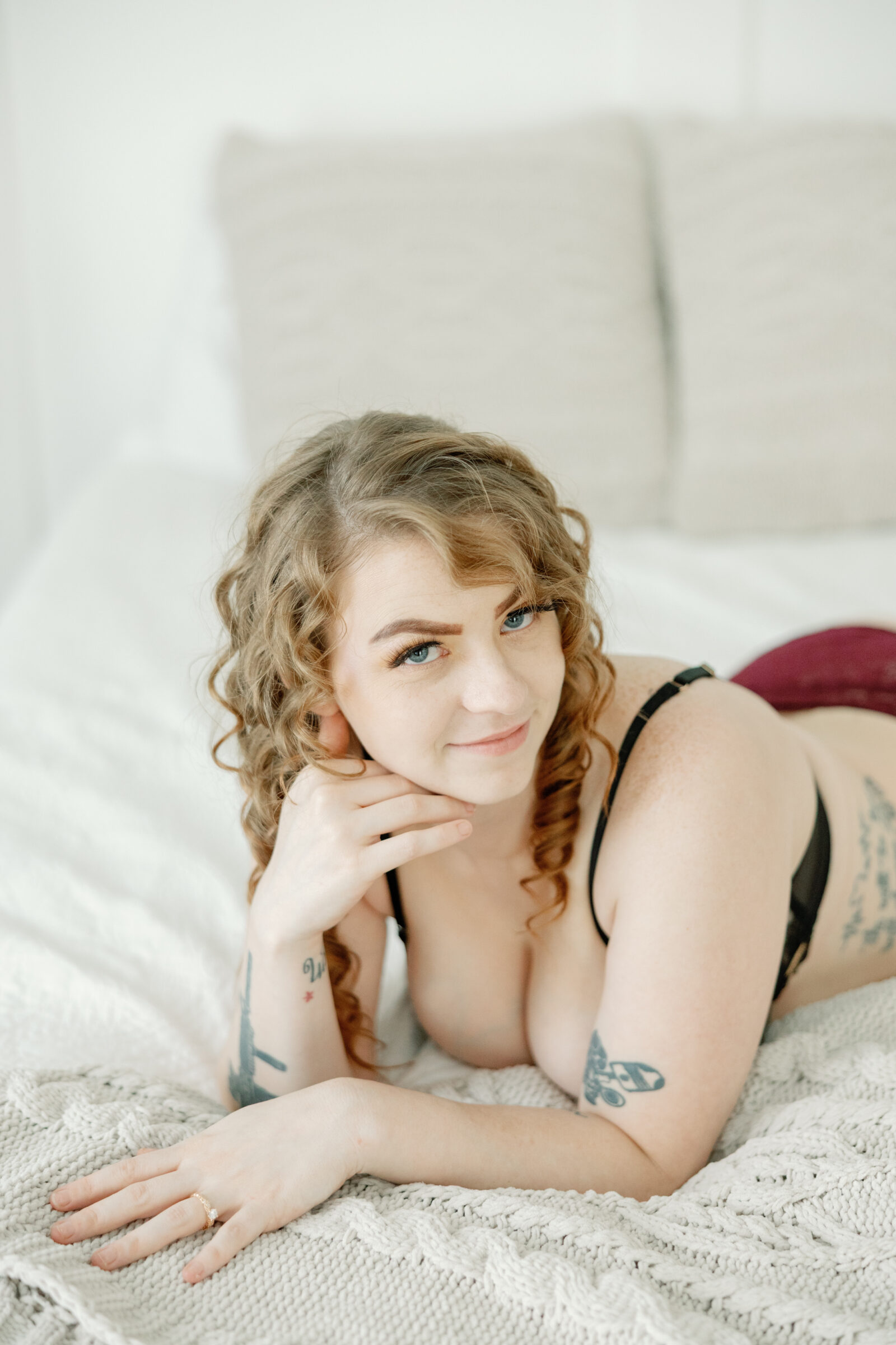 A Bold Summer Boudoir Session in RIchmond VA | girl in lingerie lays on bed
