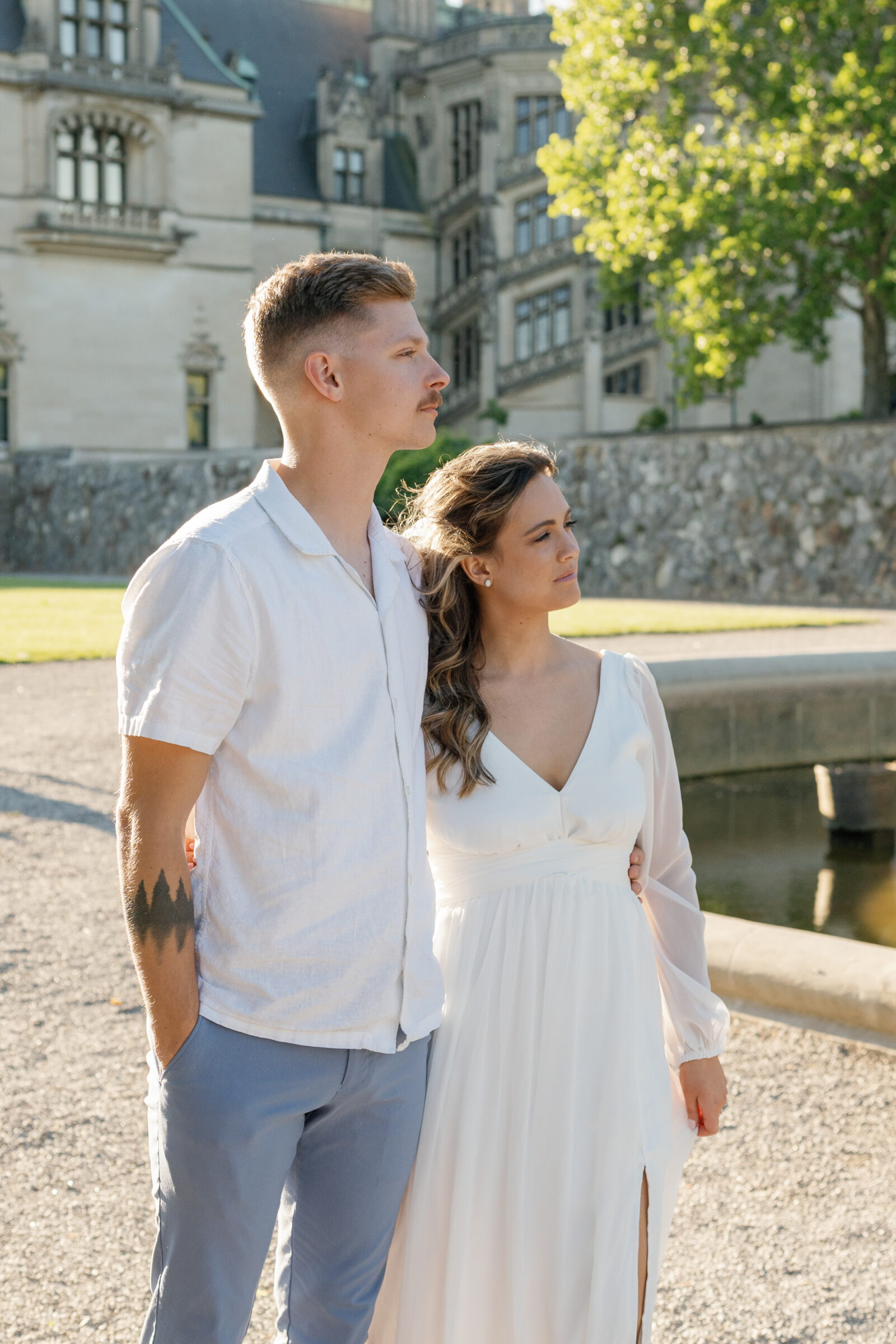 Engagement Photos at the Biltmore Estate | couple look in the distance