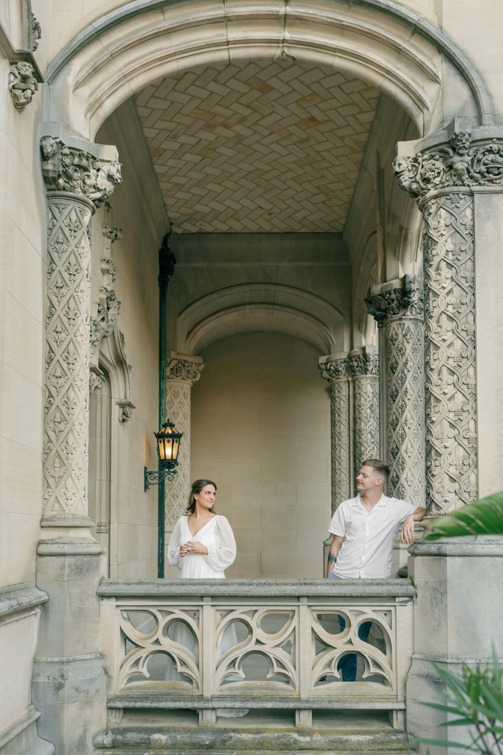 Engagement Photos at the Biltmore Estate House | couple look at each other