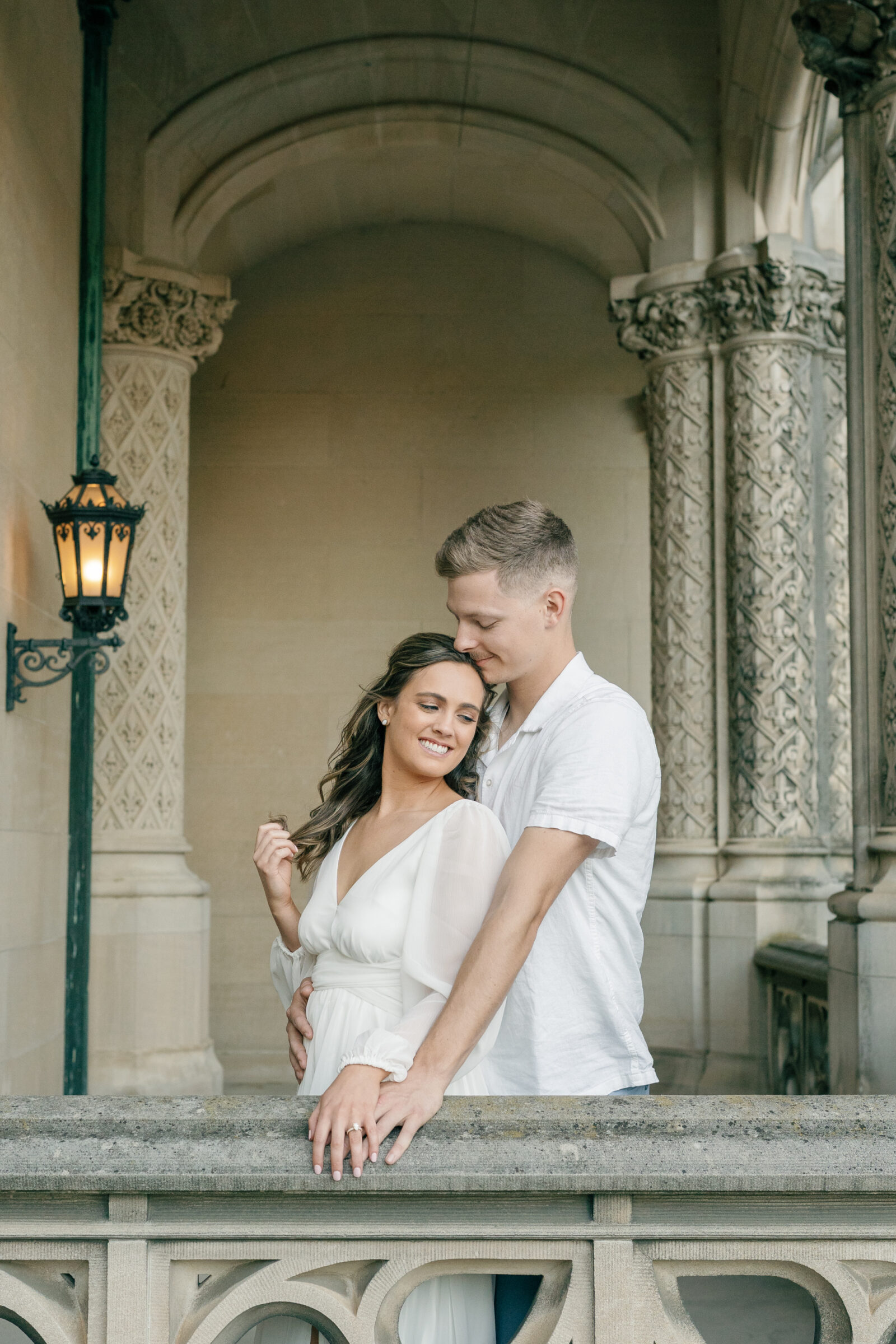 Engagement Photos at the Biltmore Estate House | couple nuzzle together