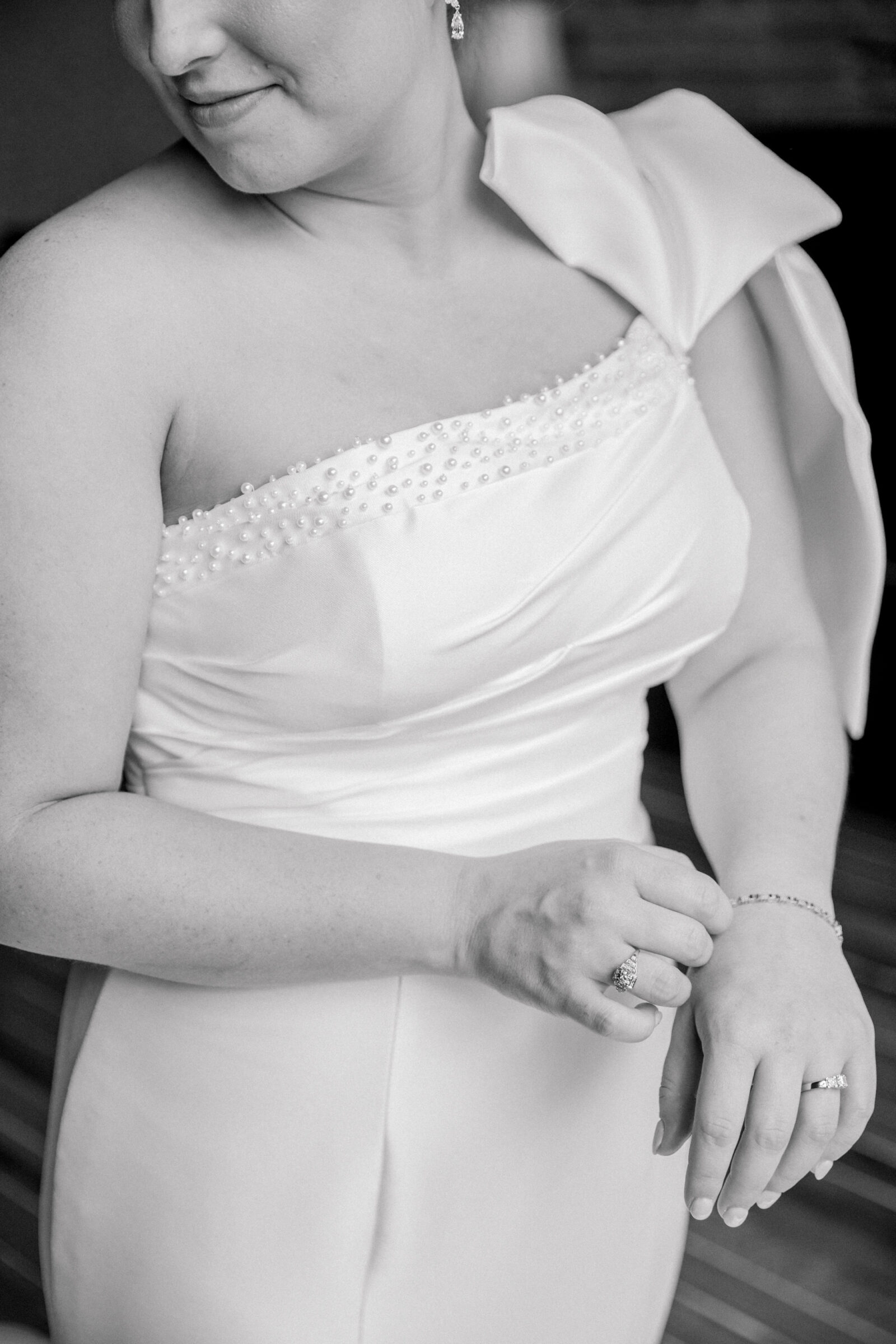 Southwest VA Wedding Photographer | black and white image of bride adjusting her bracelet