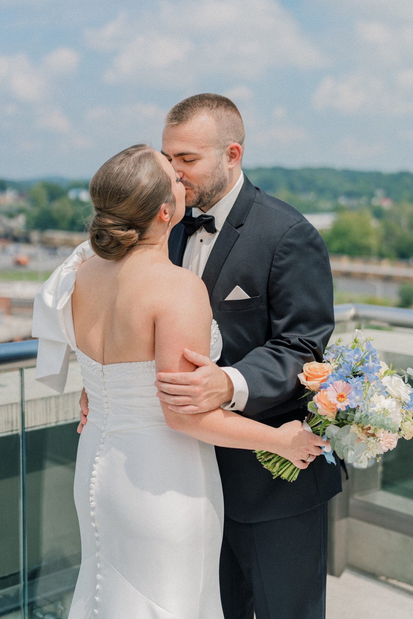 Bristol Hotel Wedding | bride and groom share a kiss during first look