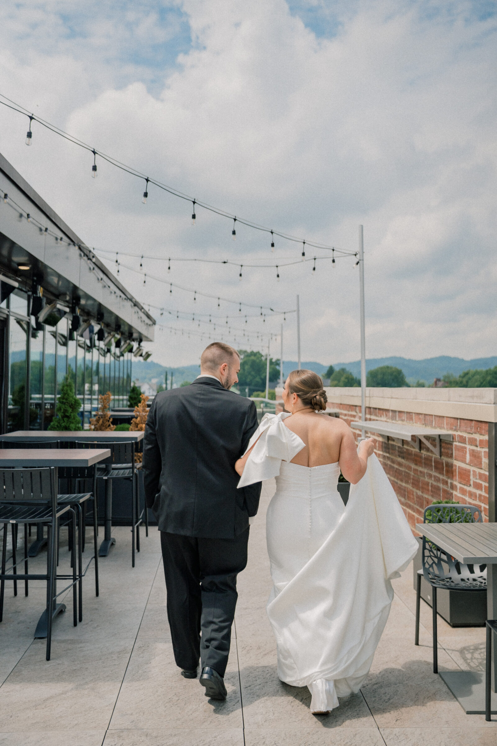 Bristol Hotel Wedding | bride and groom walk on rooftop