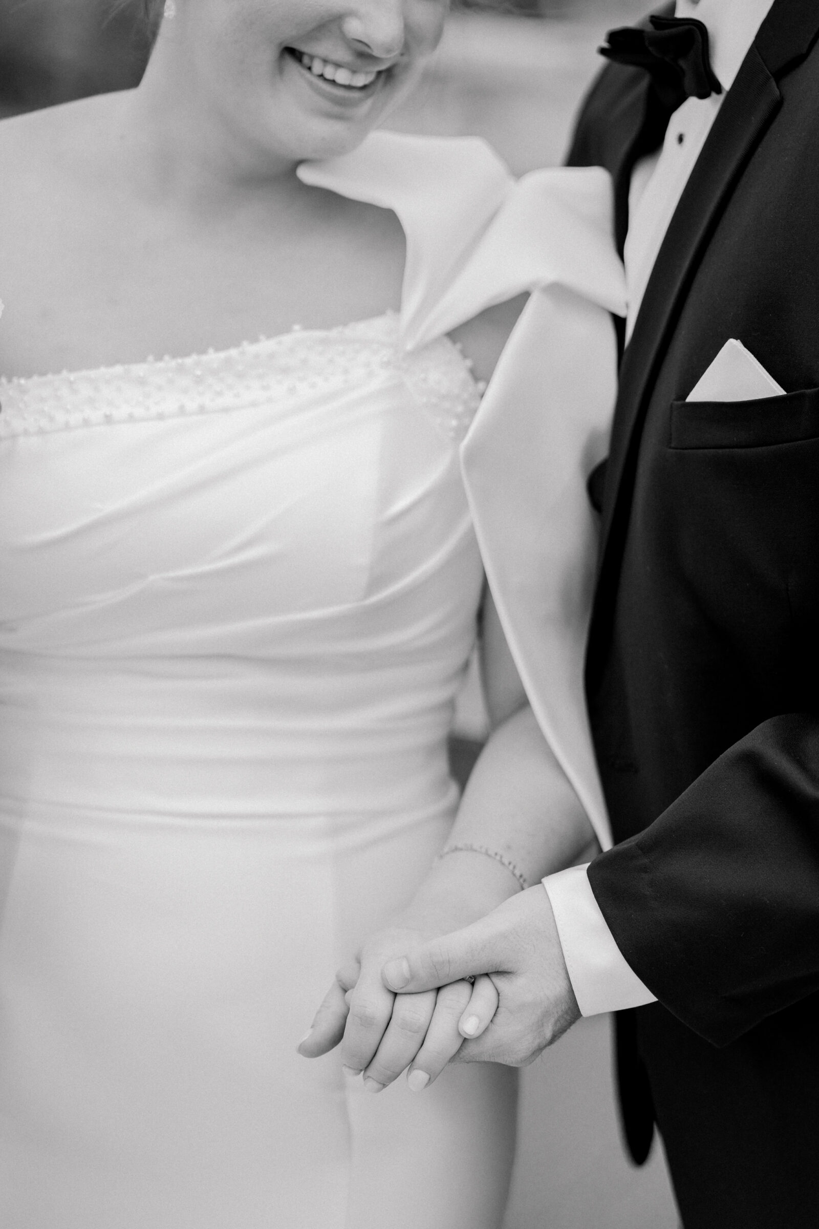 Bristol Hotel Wedding | black and white image of bride and groom holding hands