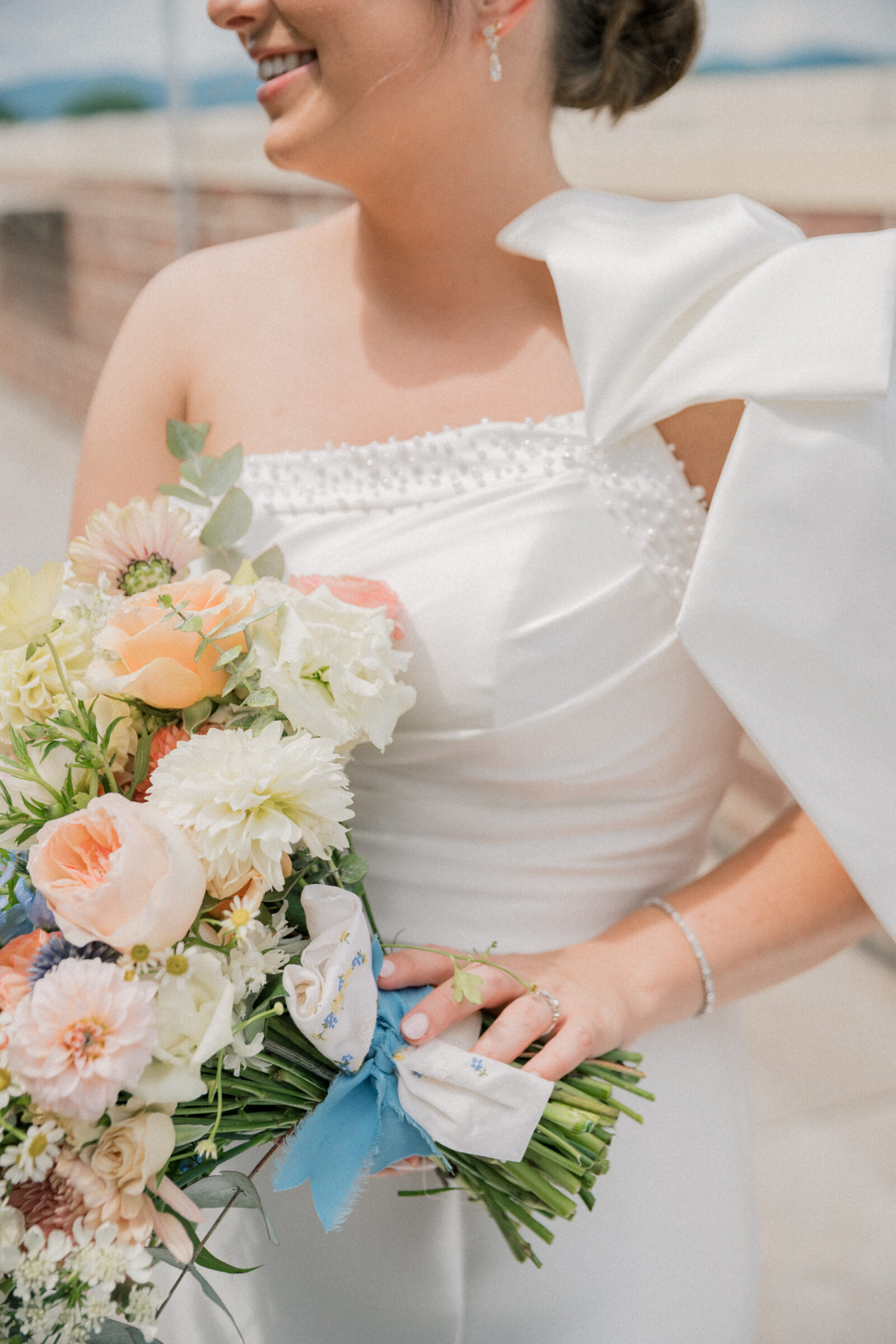 Bristol Hotel Wedding | bride touches her bouquet
