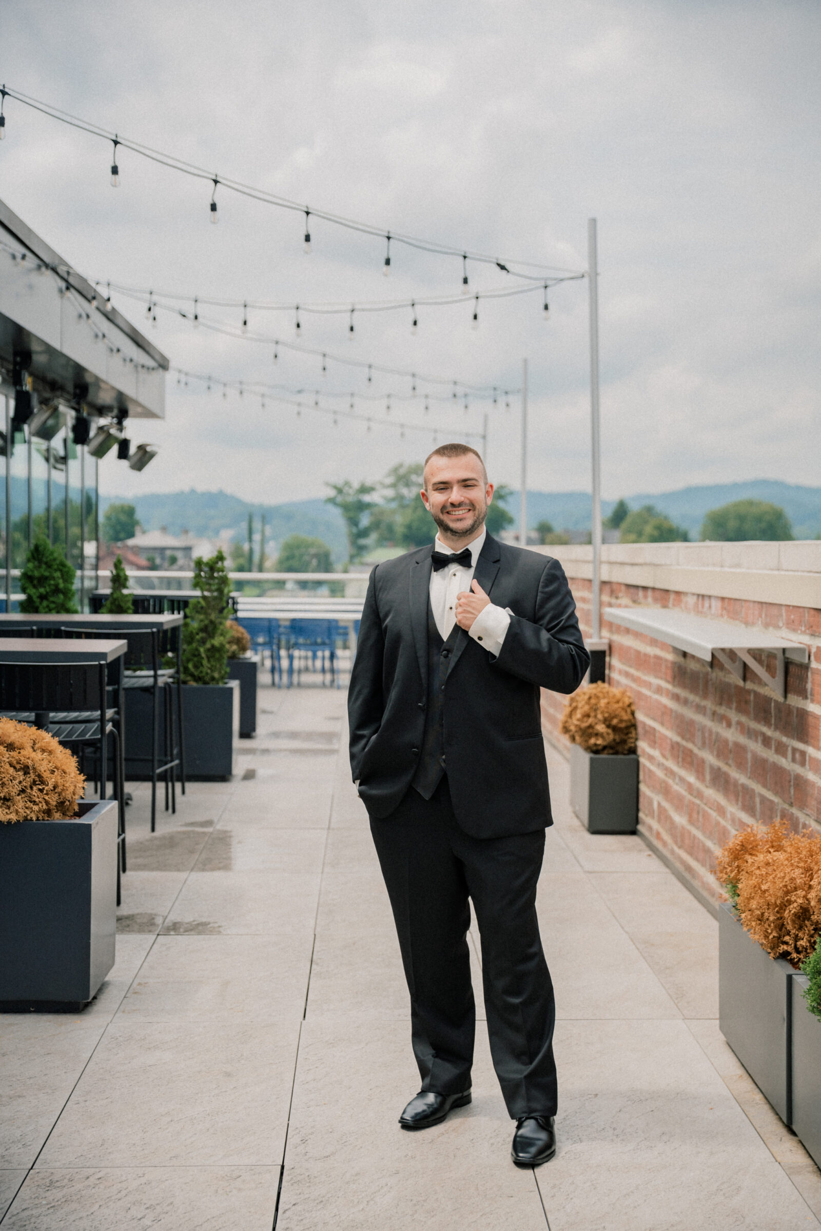 Bristol Hotel Wedding | groom on the rooftop of the Bristol Hotel