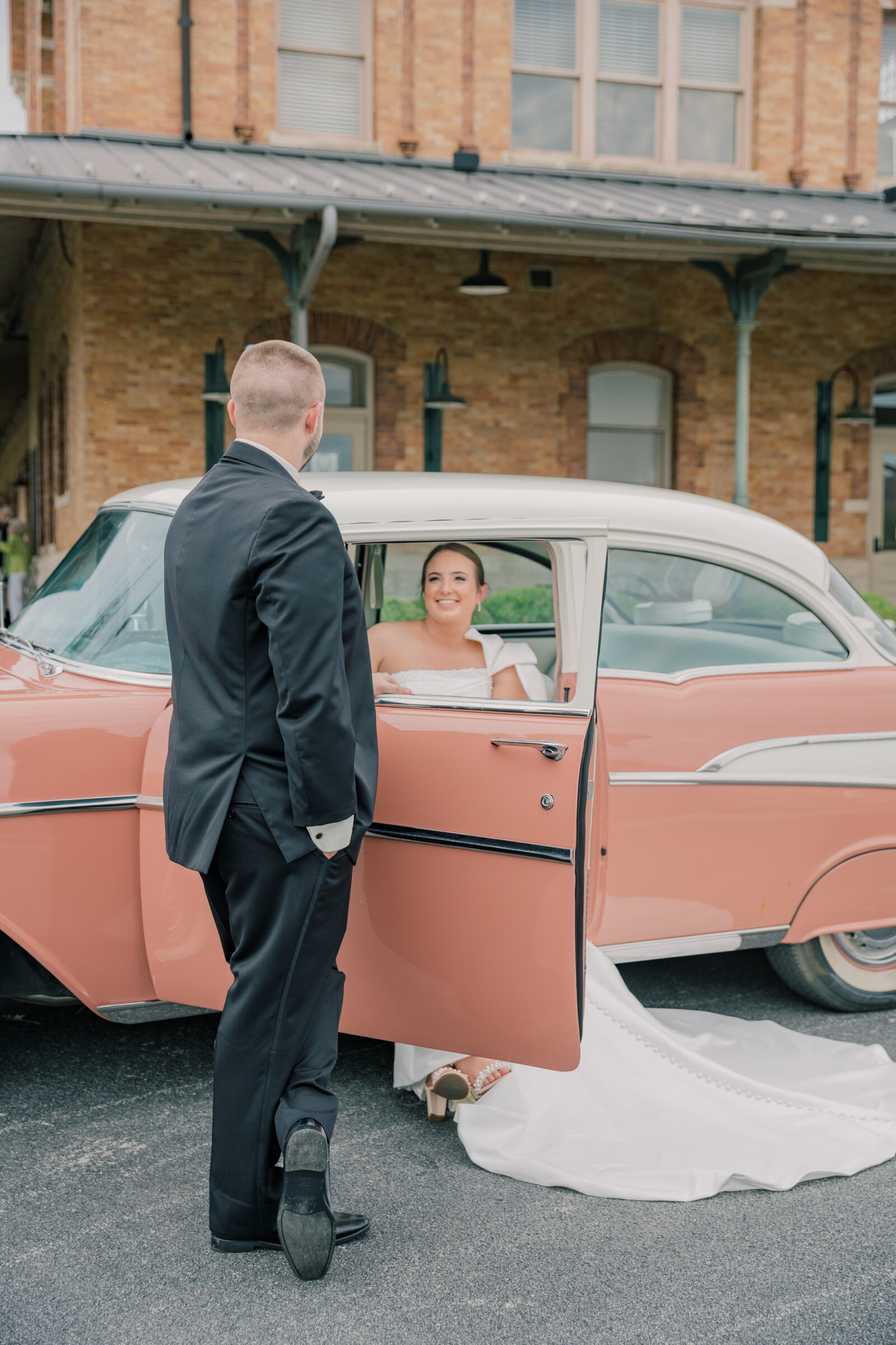 Bristol Train Station Wedding | bride and groom with a vintage car