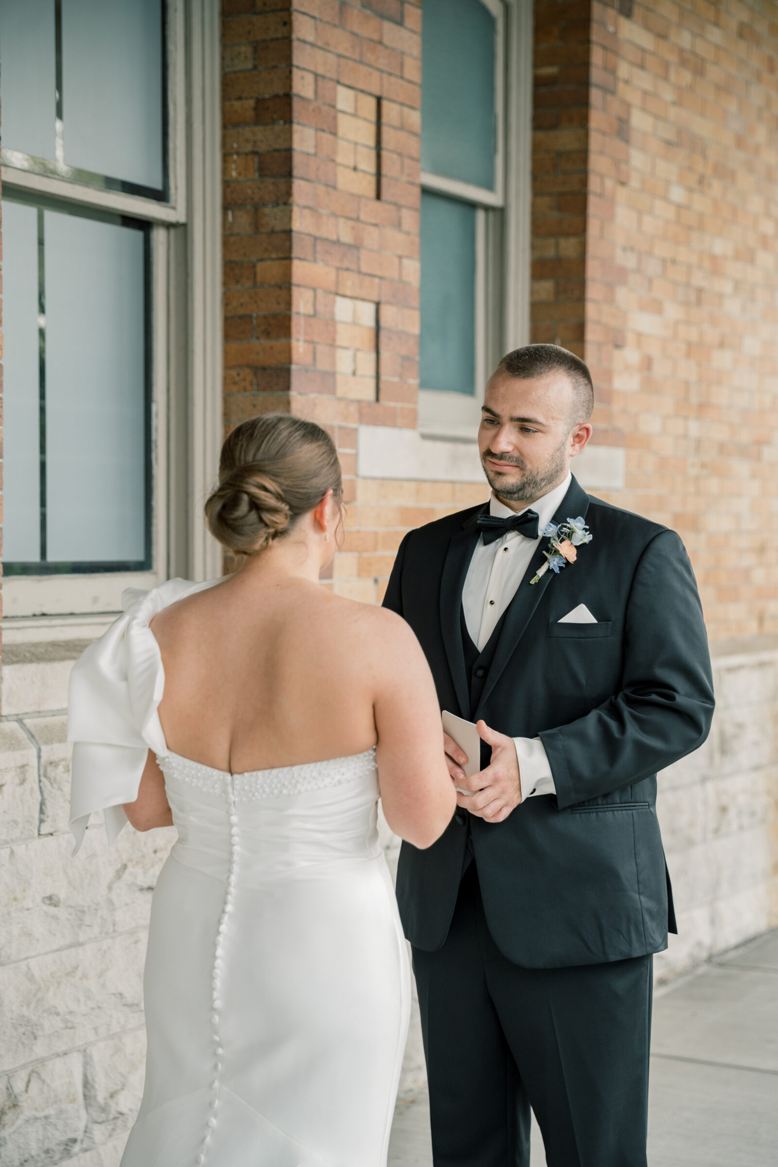 Bristol Train Station Wedding | bride and groom share private vows outside of the Bristol Train Station