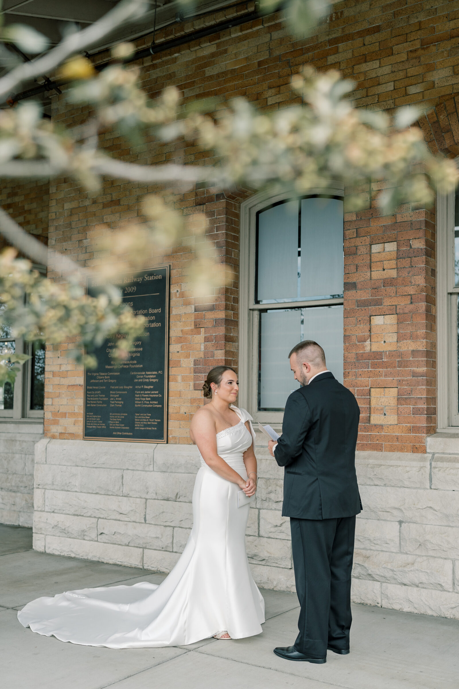 Bristol Train Station Wedding | bride and groom share private vows before their ceremony at the Bristol Train Station