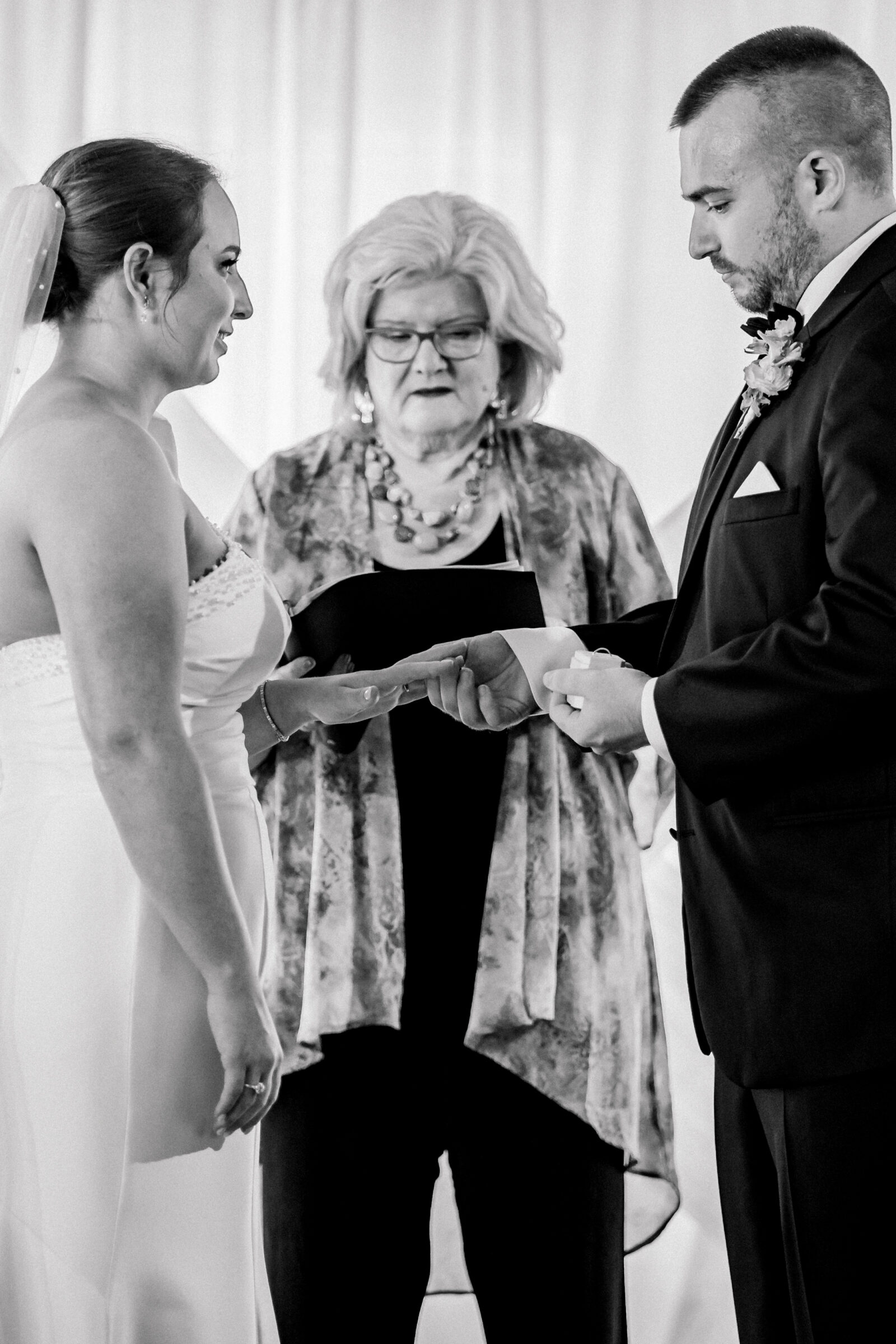 Bristol Train Station Wedding | bride and groom exchange rings