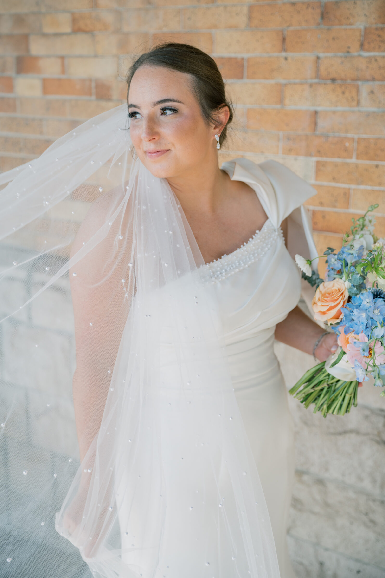 Bristol Train Station Wedding | bride with veil outside of the Bristol Train Station