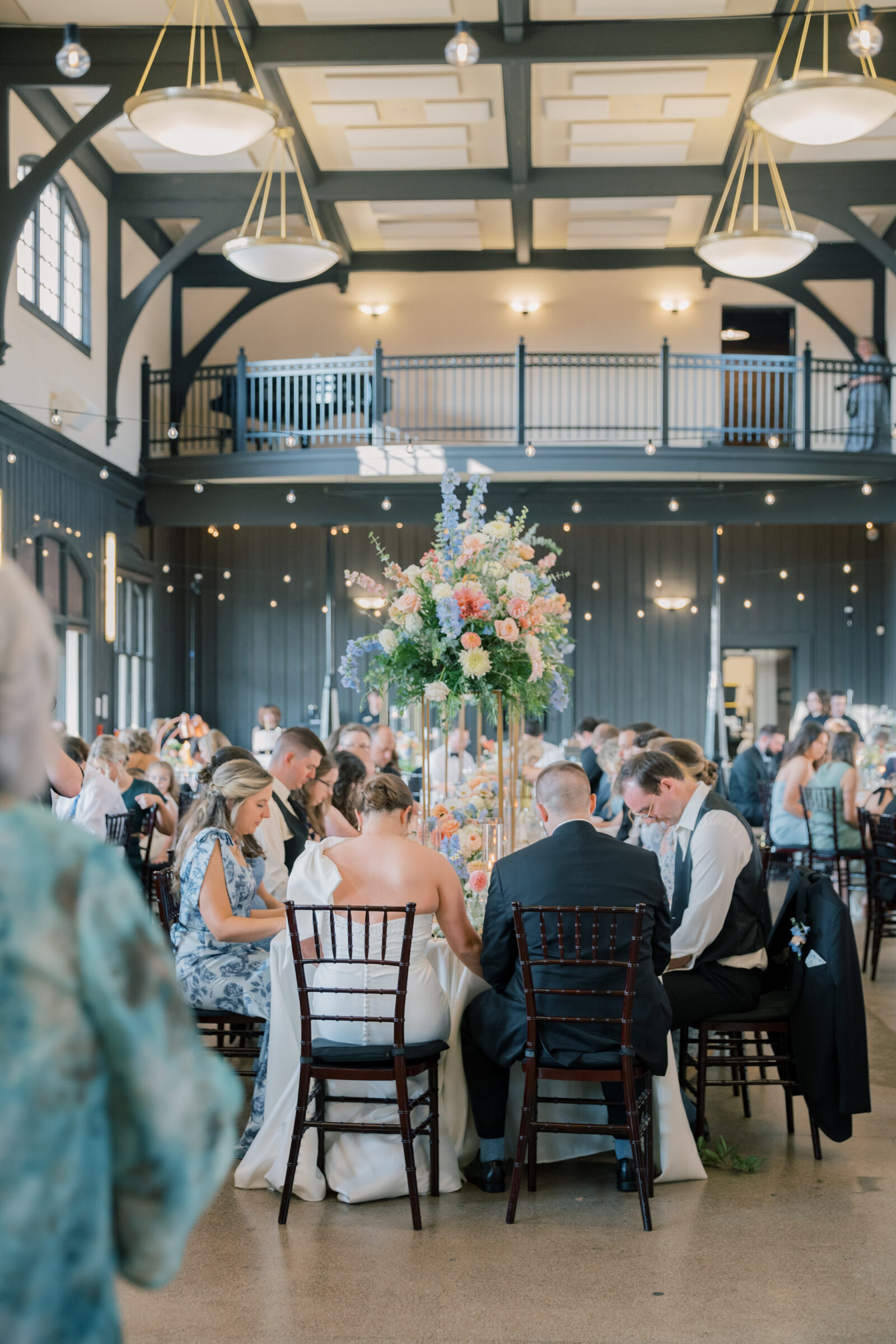 Bristol Train Station Wedding | prayer before dinner at wedding reception