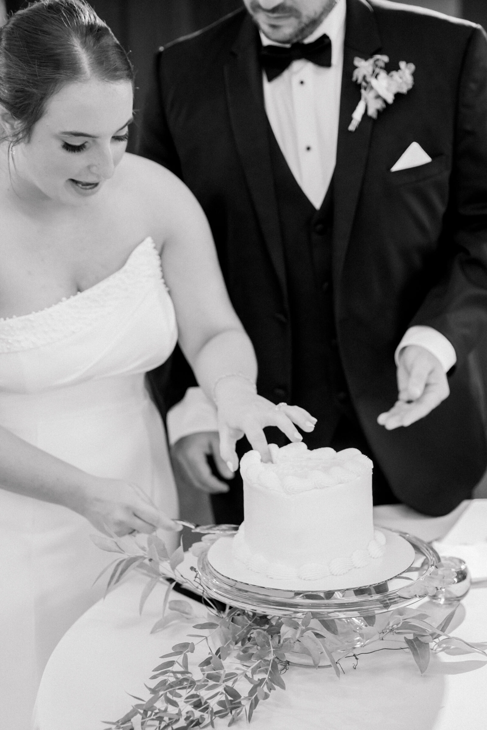 Bristol Train Station Wedding | bride and groom cut wedding cake