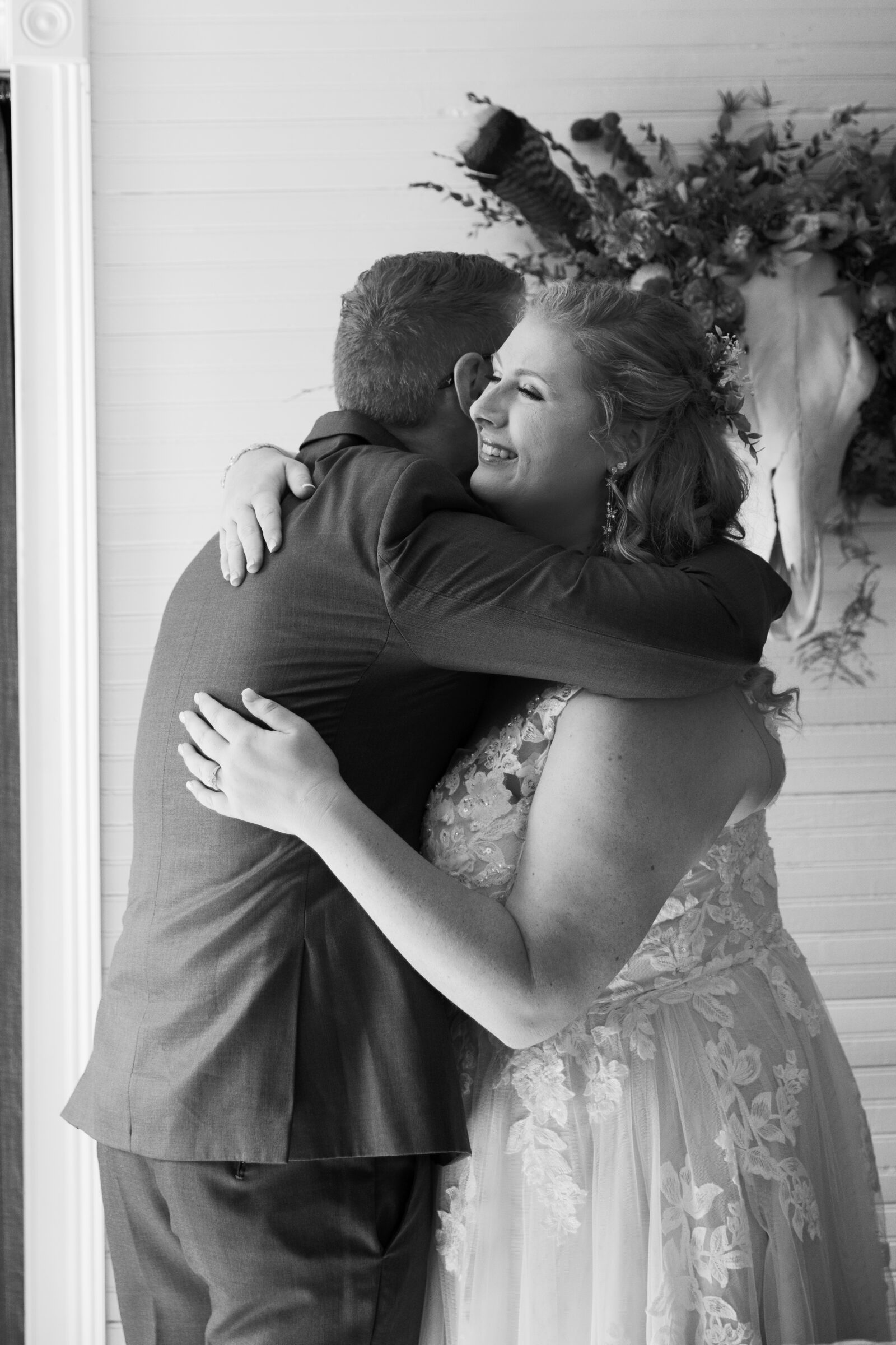 Full Bloom Farm Wedding | bride and brother share a hug before bride's wedding