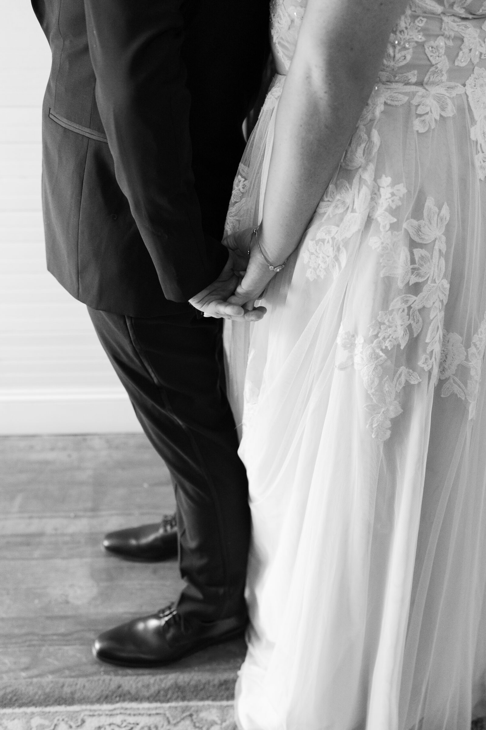 Full Bloom Farm Wedding | bride and groom hold hands without seeing each other before wedding ceremony