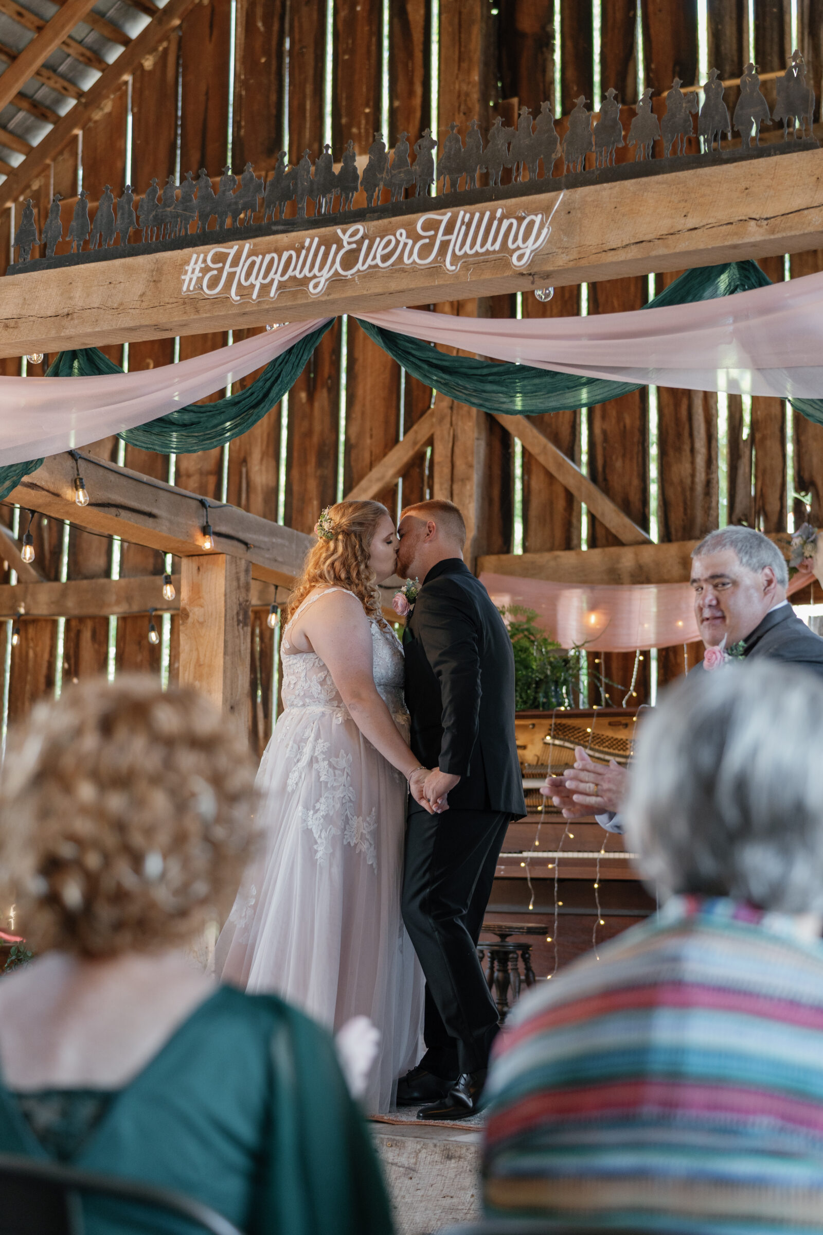 Full Bloom Farm Wedding | bride and groom share first kiss