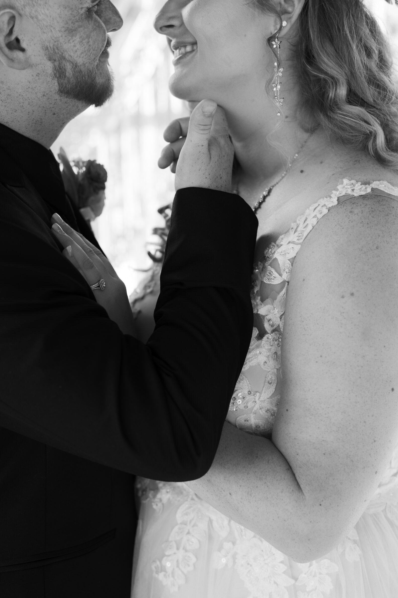 Full Bloom Farm Wedding | groom pulls bride in for a kiss