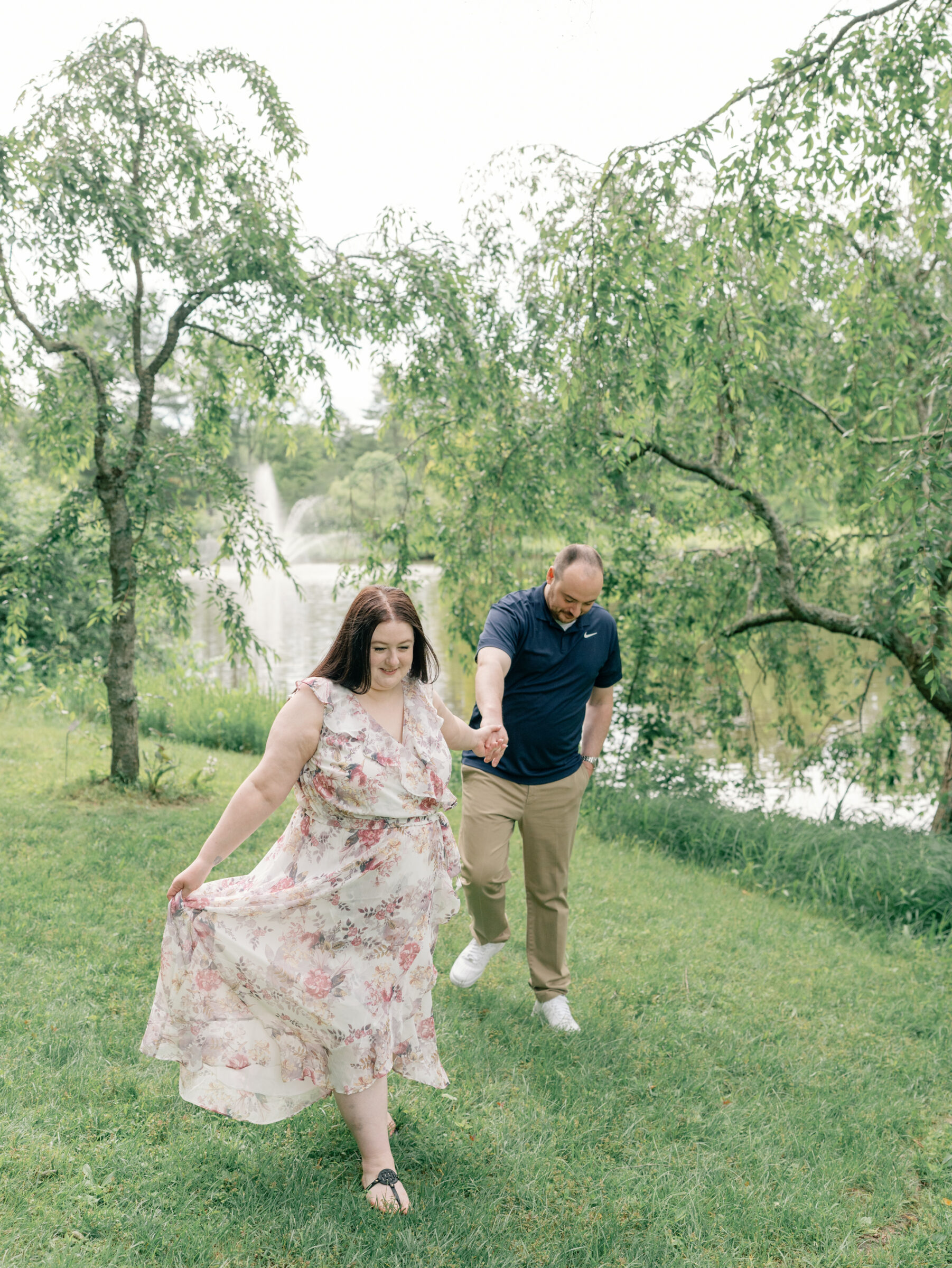 Meadowlark Botanical Gardens Engagement Photos | bride leads her groom as they walk hand in hand at Northern VA botanical garden