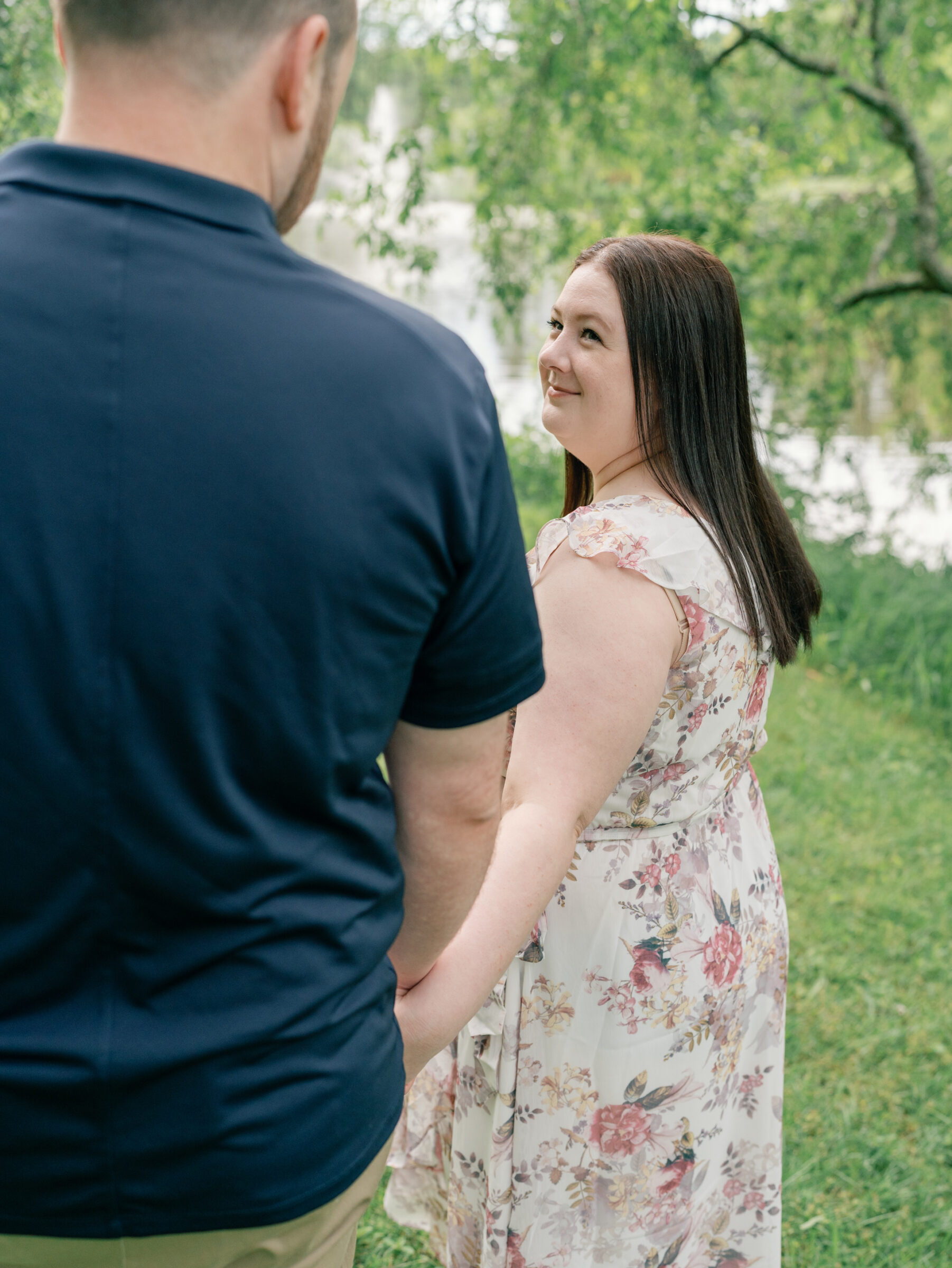 Meadowlark Botanical Gardens Engagement Session | bride-to-be looks up at her groom