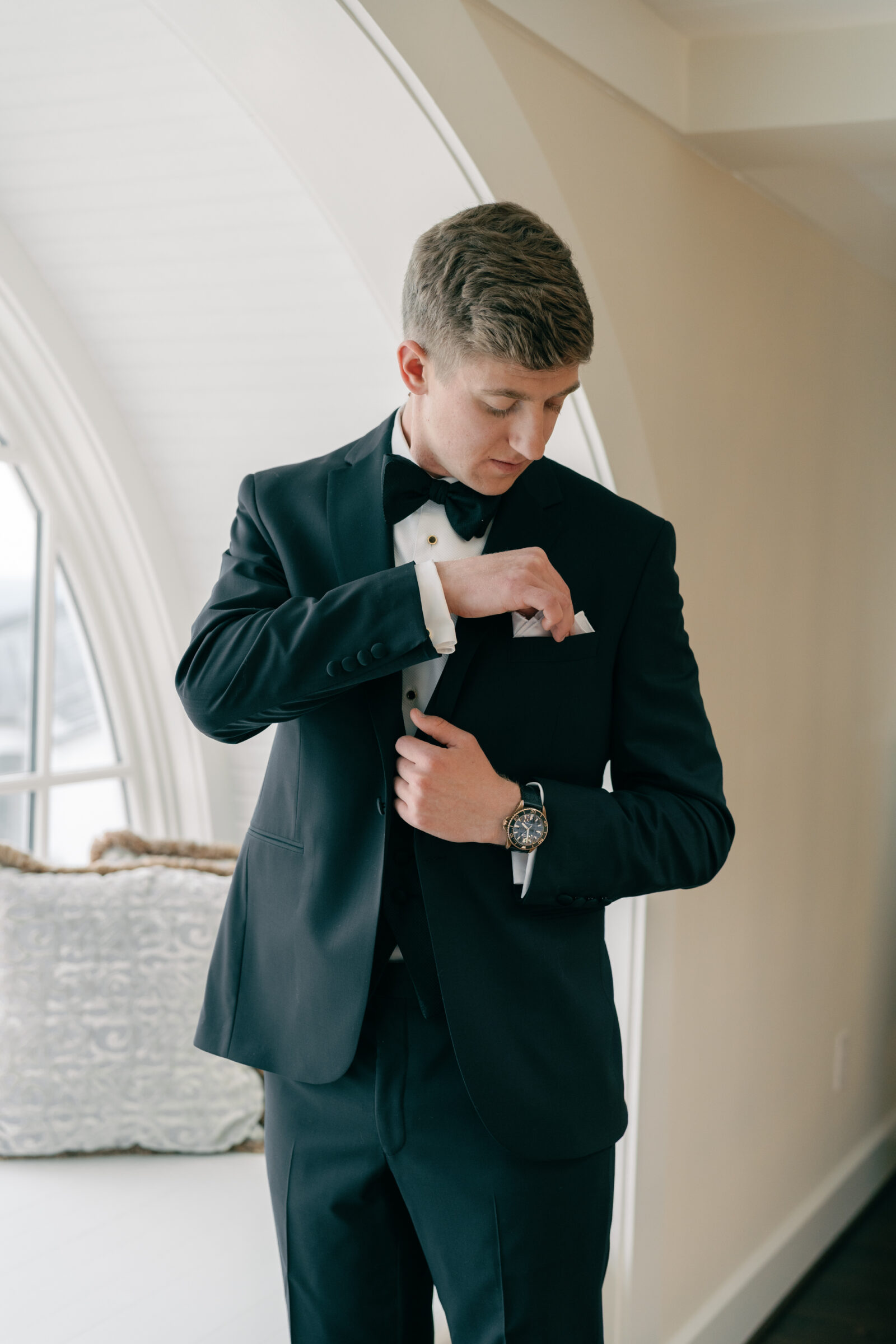 Charlottesville VA Wedding Photographer | groom adjusts pocket square