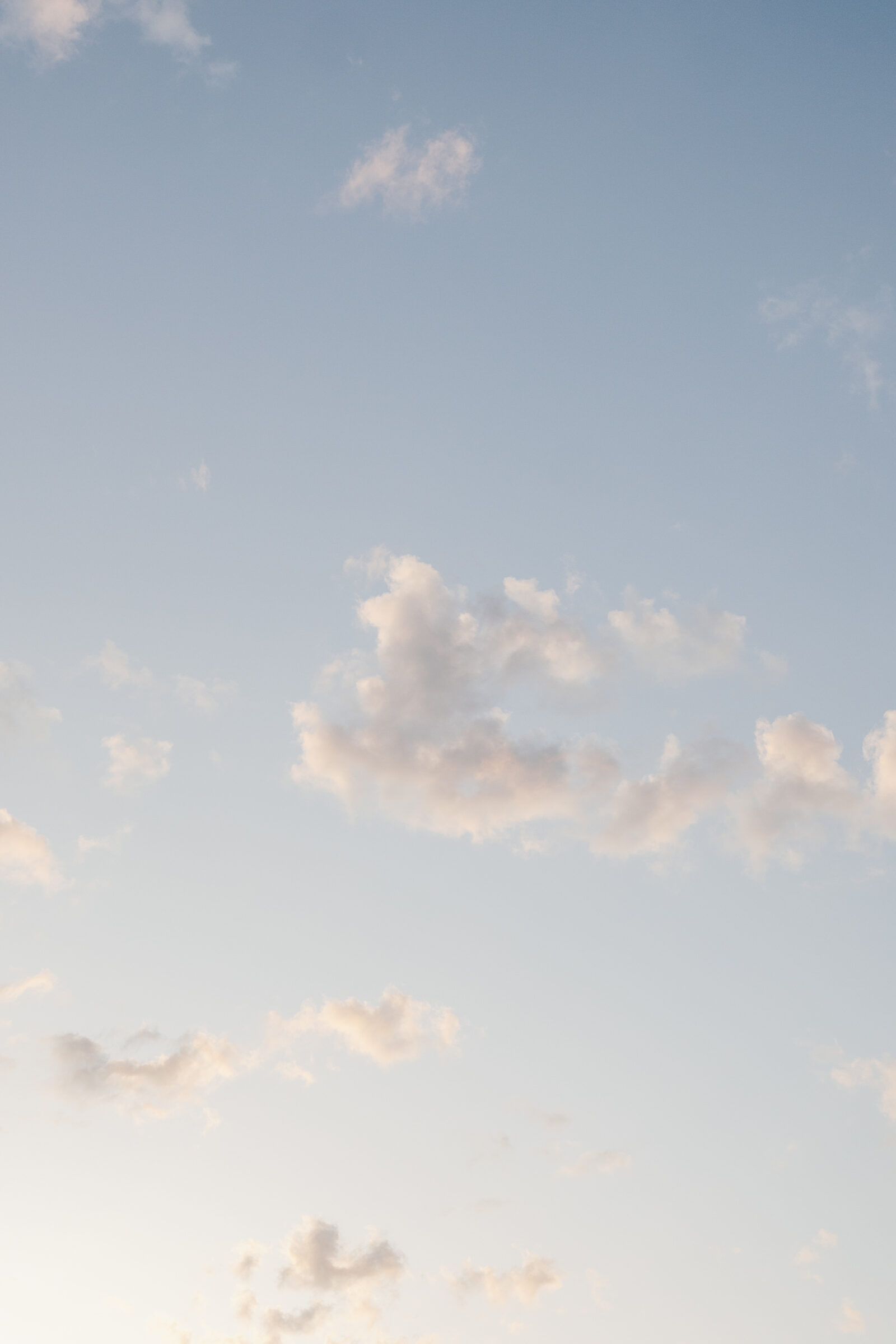 Soft pastel clouds float across a spring sky above Northfield Estate in Cumberland, VA, creating a serene and romantic backdrop for this Northfield Estate wedding captured by a Richmond wedding photographer.