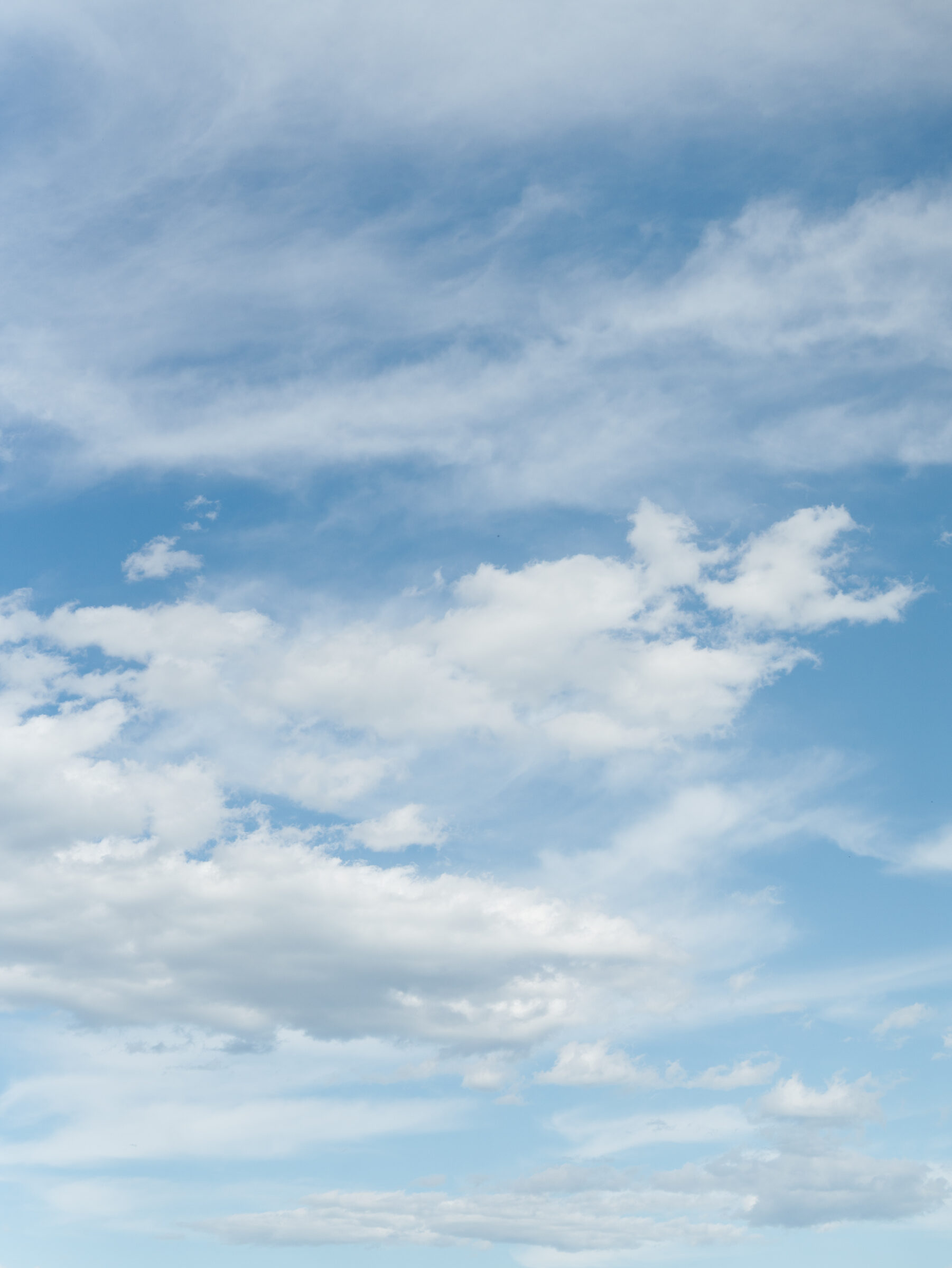 Dreamy blue sky with wispy white clouds above the Trump Winery Wedding grounds in Charlottesville